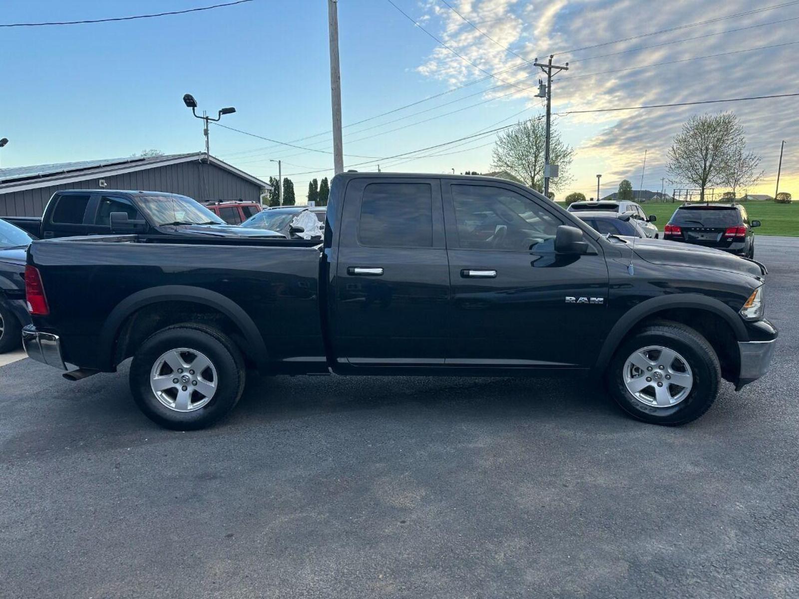 2010 Black Dodge Ram 1500 (1D7RV1GP9AS) with an 4.7L V8 4.7L V8 engine, located at 4845 Woodbury Pike, Roaring Springs, PA, (814) 317-5008, (814) 317-5008, 40.250935, -78.366959 - 2010 Dodge Ram SLT 1500, automatic, 4.7L, 227k, CD, air conditioning, power windows/locks, cruise/tilt wheel, two new tires and brake calipers on the front. Runs and drives good. Not a rusted out truck! Good shape! Truck is being sold as is. Truck has a reconstructed title due to rear bumper an - Photo #0