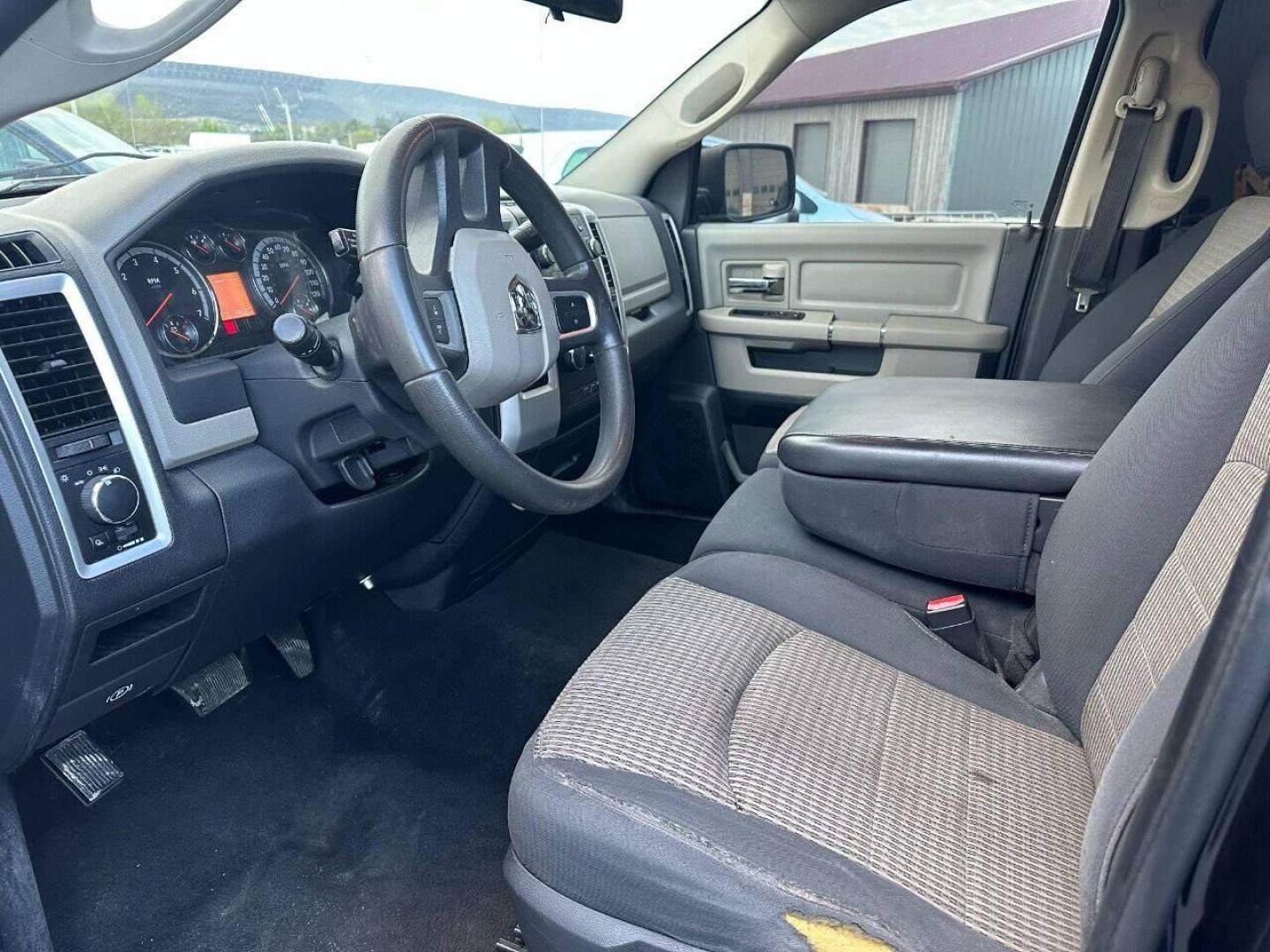 2010 Black Dodge Ram 1500 (1D7RV1GP9AS) with an 4.7L V8 4.7L V8 engine, located at 4845 Woodbury Pike, Roaring Springs, PA, (814) 317-5008, (814) 317-5008, 40.250935, -78.366959 - 2010 Dodge Ram SLT 1500, automatic, 4.7L, 227k, CD, air conditioning, power windows/locks, cruise/tilt wheel, two new tires and brake calipers on the front. Runs and drives good. Not a rusted out truck! Good shape! Truck is being sold as is. Truck has a reconstructed title due to rear bumper an - Photo#5