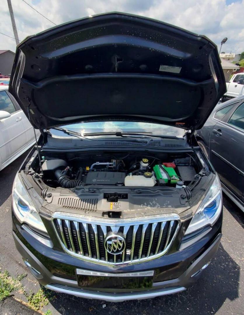 2015 Black Buick Encore (KL4CJHSB4FB) with an 1.4L I4 Turbocharger 1.4L I4 engine, located at 4845 Woodbury Pike, Roaring Springs, PA, (814) 317-5008, (814) 317-5008, 40.250935, -78.366959 - 2015 Buick Encore Premium, AWD, leather, roof, power windows/locks/seats and mirrors, rain sensing windshield, park assist, hands free phone, cruise/tilt wheel and much more. Clean! Ready to go with new inspection! Warranty available! If interested, 814-317-5008 - Photo#4