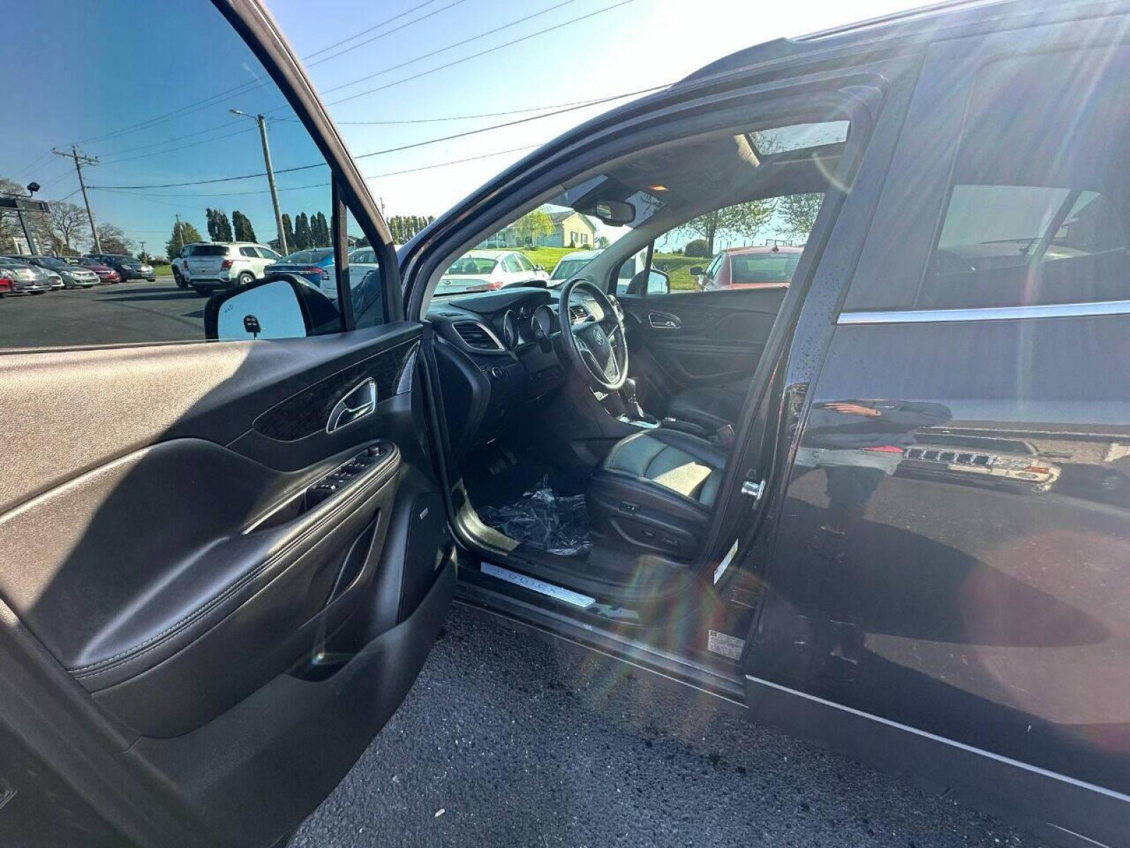 2015 Black Buick Encore (KL4CJHSB4FB) with an 1.4L I4 Turbocharger 1.4L I4 engine, located at 4845 Woodbury Pike, Roaring Springs, PA, (814) 317-5008, (814) 317-5008, 40.250935, -78.366959 - 2015 Buick Encore Premium, AWD, leather, roof, power windows/locks/seats and mirrors, rain sensing windshield, park assist, hands free phone, cruise/tilt wheel and much more. Clean! Ready to go with new inspection! Warranty available! If interested, 814-317-5008 or 814-497-4383. - Photo #9