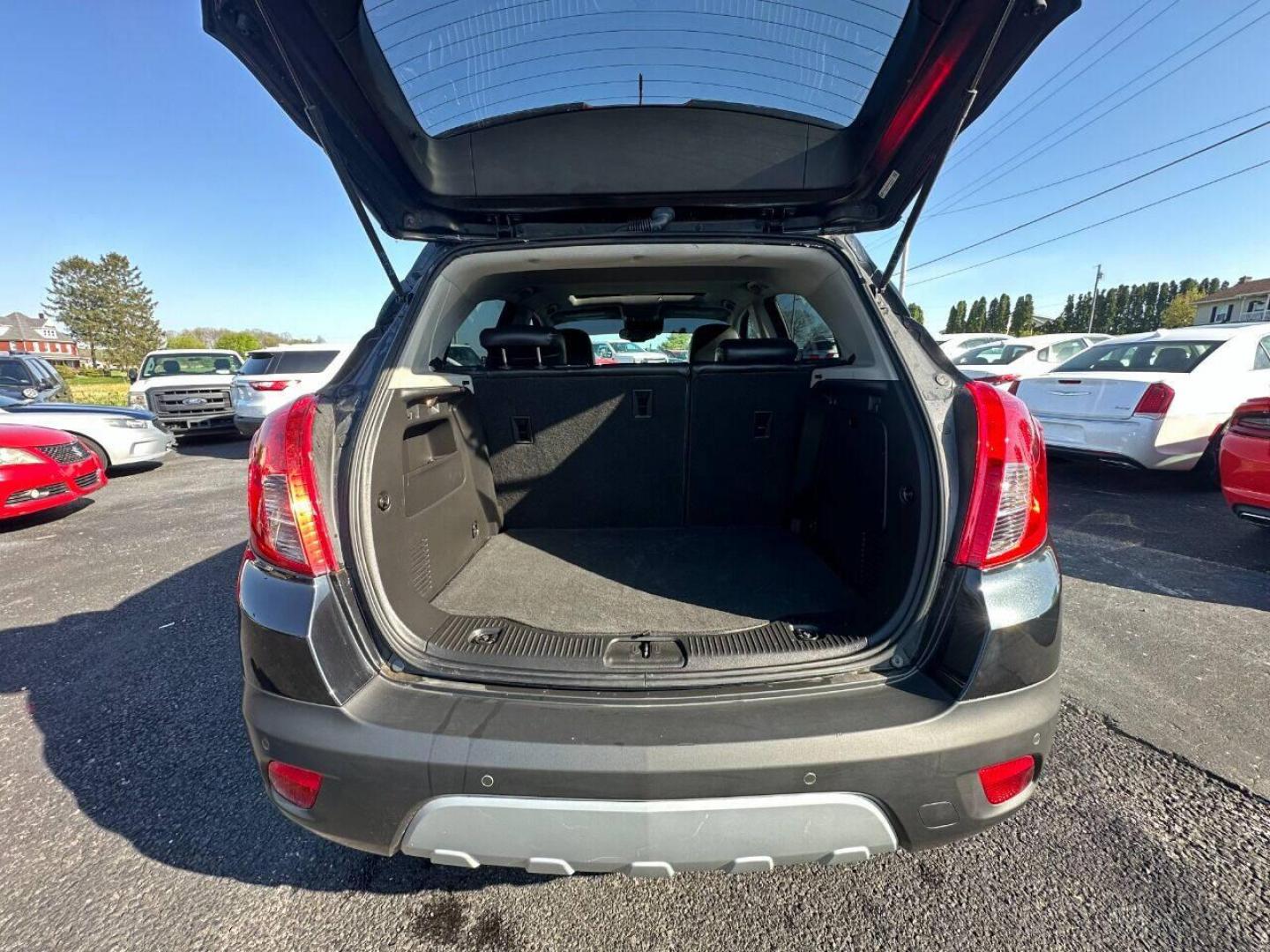 2015 Black Buick Encore (KL4CJHSB4FB) with an 1.4L I4 Turbocharger 1.4L I4 engine, located at 4845 Woodbury Pike, Roaring Springs, PA, (814) 317-5008, (814) 317-5008, 40.250935, -78.366959 - Photo#11