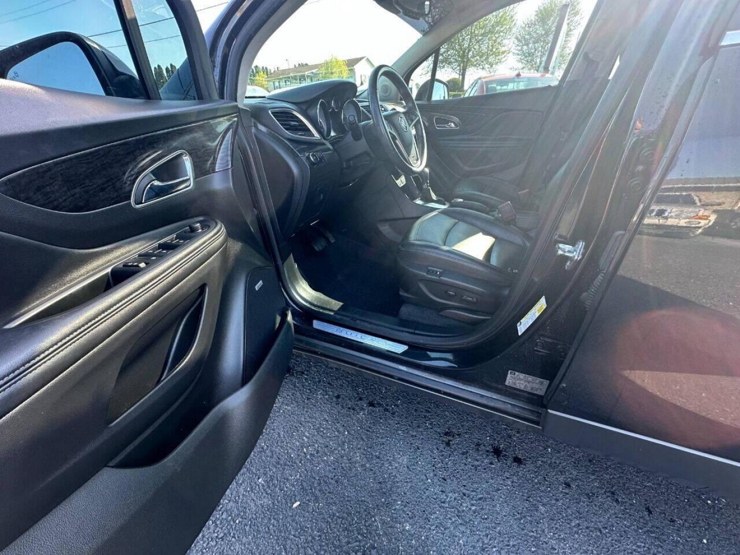 2015 Black Buick Encore (KL4CJHSB4FB) with an 1.4L I4 Turbocharger 1.4L I4 engine, located at 4845 Woodbury Pike, Roaring Springs, PA, (814) 317-5008, (814) 317-5008, 40.250935, -78.366959 - Photo#4