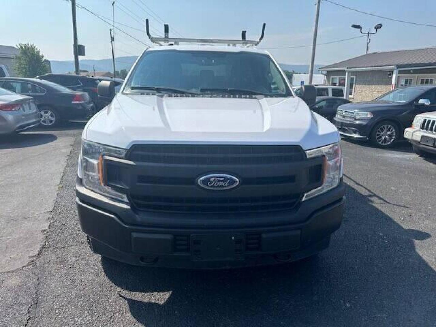 2018 White Ford F-150 (1FTMF1E51JK) with an 5.0L V8 5.0L V8 engine, located at 4845 Woodbury Pike, Roaring Springs, PA, (814) 317-5008, (814) 317-5008, 40.250935, -78.366959 - Photo#0