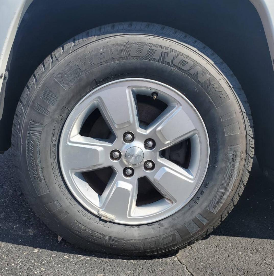 2012 White Jeep Liberty (1C4PJMAK4CW) with an 3.7L V6 3.7L V6 engine, located at 4845 Woodbury Pike, Roaring Springs, PA, (814) 317-5008, (814) 317-5008, 40.250935, -78.366959 - 2012 Jeep Liberty Latitude 4x4 3.7L V6 Automatic 128k Miles 1 Owner company vehicle, well maintained, Just had different wheels and 4 brand new tires put on (as shown in last pic). Power Windows and Locks, A/c, Single CD Player. Rust-free Southern Vehicle! New Inspection. Vehicle will come with a 3- Photo#16
