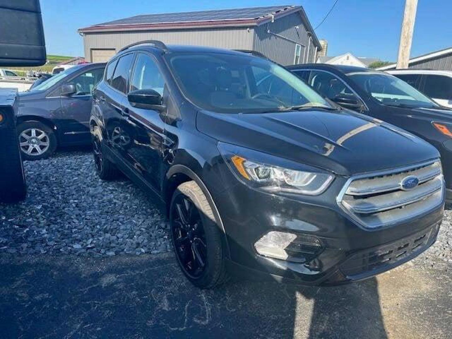 2019 Black Ford Escape (1FMCU9GDXKU) with an 1.5L I4 Turbocharger 1.5L I4 engine, located at 4845 Woodbury Pike, Roaring Springs, PA, (814) 317-5008, (814) 317-5008, 40.250935, -78.366959 - 2019 FORD ESCAPE AWD 1.5 L I4 TURBO ALL WHEEL DRIVE, BLACK OUT PACKAGE AUTOMATIC TRANSMISSION A/C ALL LEATHER AND HEATED SEATS.NAVIGATION POWER GATE POWER WINDOWS AND LOCKS SIRIUS RADIO.BACK UP CAMERA BLACK WHEELS BLUE TOOTH. NEW TIRES RUN GREAT NEW INSPECTION BEING SOLD AT LOWER COST BECAUSE IT IS - Photo#0