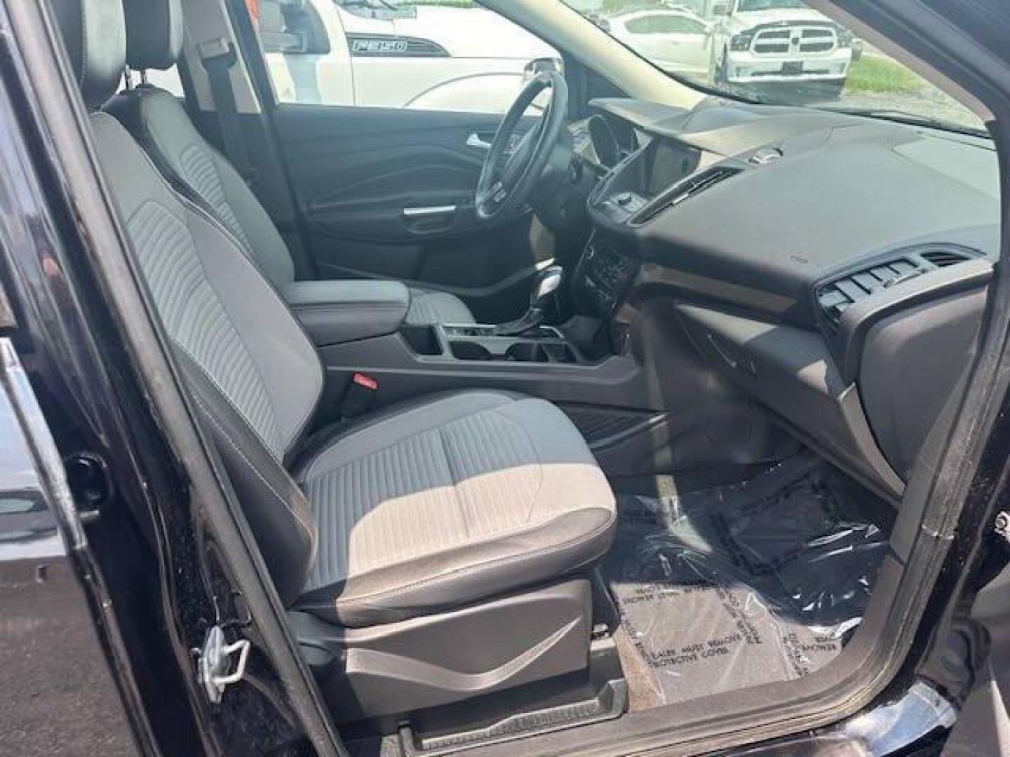 2019 Black Ford Escape (1FMCU9GDXKU) with an 1.5L I4 Turbocharger 1.5L I4 engine, located at 4845 Woodbury Pike, Roaring Springs, PA, (814) 317-5008, (814) 317-5008, 40.250935, -78.366959 - 2019 FORD ESCAPE AWD 1.5 L I4 TURBO ALL WHEEL DRIVE, BLACK OUT PACKAGE AUTOMATIC TRANSMISSION A/C ALL LEATHER AND HEATED SEATS.NAVIGATION POWER GATE POWER WINDOWS AND LOCKS SIRIUS RADIO.BACK UP CAMERA BLACK WHEELS BLUE TOOTH. NEW TIRES RUN GREAT NEW INSPECTION BEING SOLD AT LOWER COST BECAUSE IT IS - Photo#9