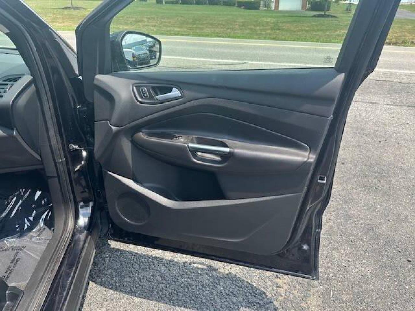 2019 Black Ford Escape (1FMCU9GDXKU) with an 1.5L I4 Turbocharger 1.5L I4 engine, located at 4845 Woodbury Pike, Roaring Springs, PA, (814) 317-5008, (814) 317-5008, 40.250935, -78.366959 - 2019 FORD ESCAPE AWD 1.5 L I4 TURBO ALL WHEEL DRIVE, BLACK OUT PACKAGE AUTOMATIC TRANSMISSION A/C ALL LEATHER AND HEATED SEATS.NAVIGATION POWER GATE POWER WINDOWS AND LOCKS SIRIUS RADIO.BACK UP CAMERA BLACK WHEELS BLUE TOOTH. NEW TIRES RUN GREAT NEW INSPECTION BEING SOLD AT LOWER COST BECAUSE IT IS - Photo#10