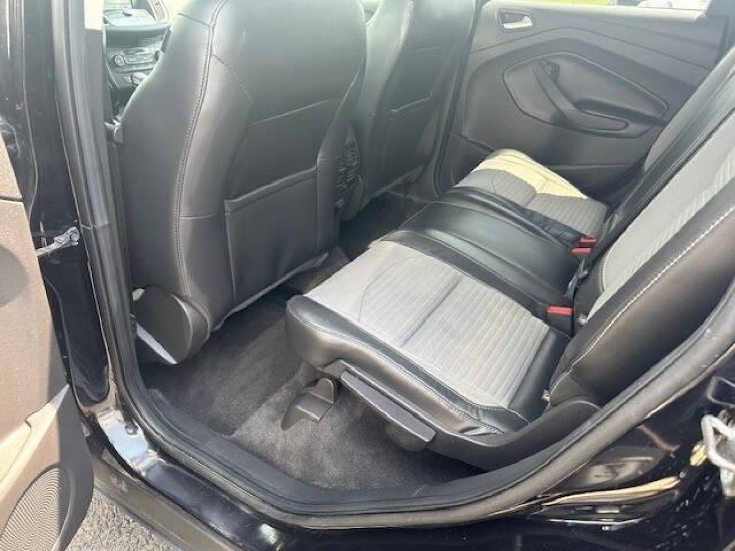2019 Black Ford Escape (1FMCU9GDXKU) with an 1.5L I4 Turbocharger 1.5L I4 engine, located at 4845 Woodbury Pike, Roaring Springs, PA, (814) 317-5008, (814) 317-5008, 40.250935, -78.366959 - 2019 FORD ESCAPE AWD 1.5 L I4 TURBO ALL WHEEL DRIVE, BLACK OUT PACKAGE AUTOMATIC TRANSMISSION A/C ALL LEATHER AND HEATED SEATS.NAVIGATION POWER GATE POWER WINDOWS AND LOCKS SIRIUS RADIO.BACK UP CAMERA BLACK WHEELS BLUE TOOTH. NEW TIRES RUN GREAT NEW INSPECTION BEING SOLD AT LOWER COST BECAUSE IT IS - Photo#11