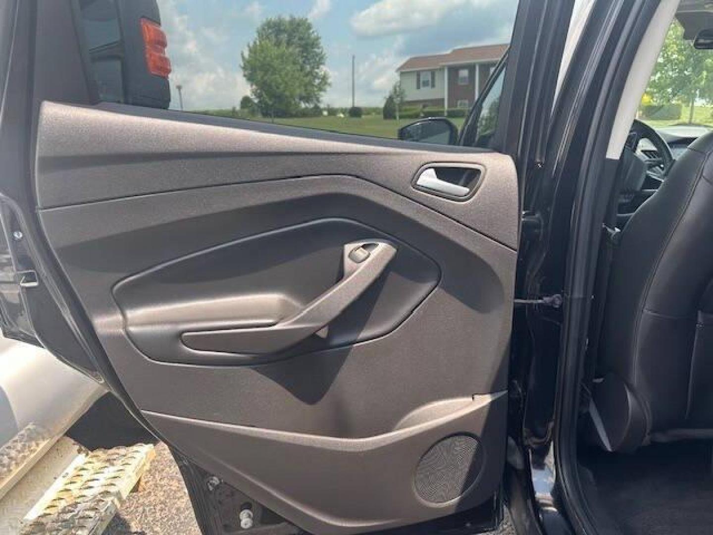 2019 Black Ford Escape (1FMCU9GDXKU) with an 1.5L I4 Turbocharger 1.5L I4 engine, located at 4845 Woodbury Pike, Roaring Springs, PA, (814) 317-5008, (814) 317-5008, 40.250935, -78.366959 - 2019 FORD ESCAPE AWD 1.5 L I4 TURBO ALL WHEEL DRIVE, BLACK OUT PACKAGE AUTOMATIC TRANSMISSION A/C ALL LEATHER AND HEATED SEATS.NAVIGATION POWER GATE POWER WINDOWS AND LOCKS SIRIUS RADIO.BACK UP CAMERA BLACK WHEELS BLUE TOOTH. NEW TIRES RUN GREAT NEW INSPECTION BEING SOLD AT LOWER COST BECAUSE IT IS - Photo#12