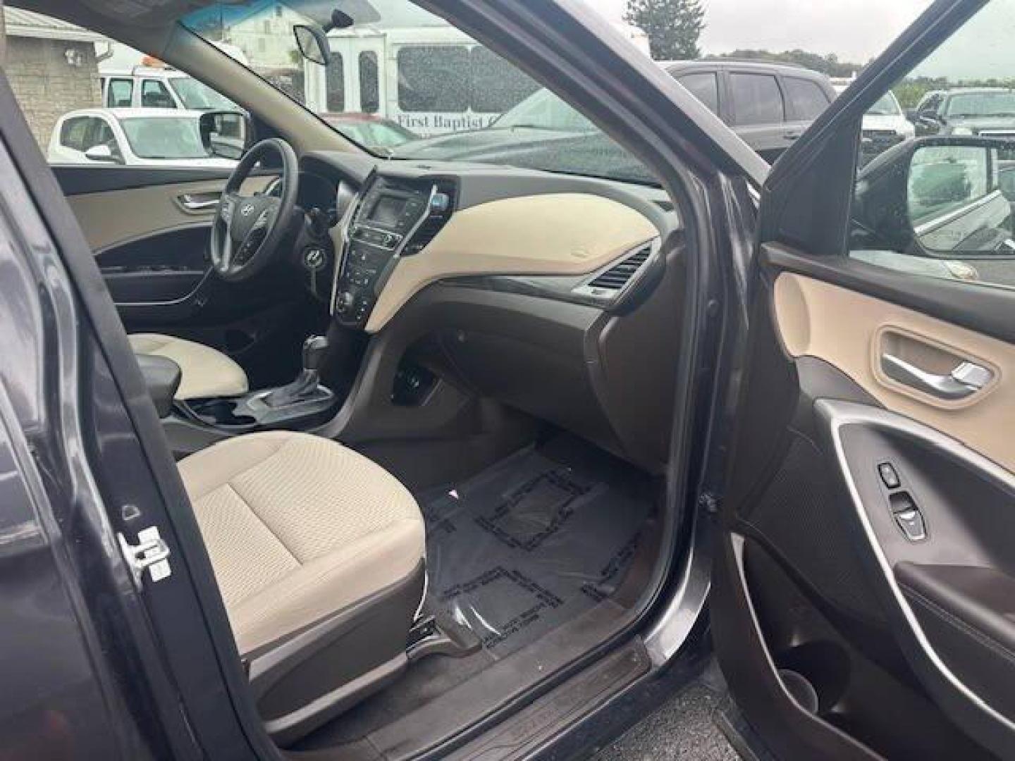 2018 Black Hyundai Santa Fe Sport (5XYZTDLB2JG) with an 2.4L I4 2.4L I4 engine, located at 4845 Woodbury Pike, Roaring Springs, PA, (814) 317-5008, (814) 317-5008, 40.250935, -78.366959 - 2018 HYUNDIA SANTAFE 2.4 L ENGINE AUTOMATIC TRANSMISSION POWER WINDOW, POWER MIRRORS, MANUAL SEAT, NEWER TIRES AND NEW STATE INSPECTION, VERY CLEAN CAR, WARRANTY IS AVAILABLE WITH CAR IF INTRESTED STOP BY FOR A TEST DRIVE OR GIVE US A CALL - Photo#2
