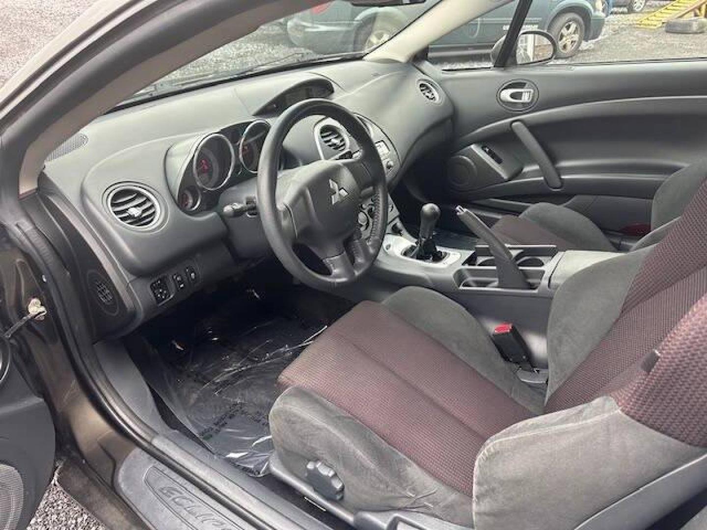 2011 Pewter Mitsubishi Eclipse (4A31K5DF5BE) with an 2.4L I4 2.4L I4 engine, located at 4845 Woodbury Pike, Roaring Springs, PA, (814) 317-5008, (814) 317-5008, 40.250935, -78.366959 - 2011 Mitsubishi Eclipse GS 2 door hatchback 2.4L engine, 5 speed manual transmission power windows power seats Am, Fm radio with CD player. New tires and new state inspection, very clean and ready to go if interested give us a call at 814-317-5008 or stop by for a test drive - Photo#6