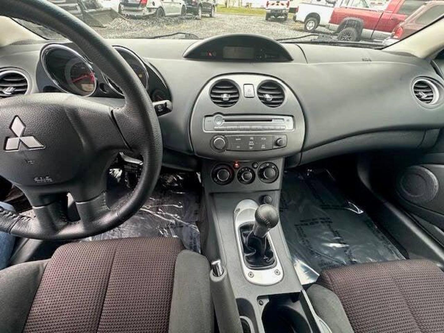 2011 Pewter Mitsubishi Eclipse (4A31K5DF5BE) with an 2.4L I4 2.4L I4 engine, located at 4845 Woodbury Pike, Roaring Springs, PA, (814) 317-5008, (814) 317-5008, 40.250935, -78.366959 - 2011 Mitsubishi Eclipse GS 2 door hatchback 2.4L engine, 5 speed manual transmission power windows power seats Am, Fm radio with CD player. New tires and new state inspection, very clean and ready to go if interested give us a call at 814-317-5008 or stop by for a test drive - Photo#9