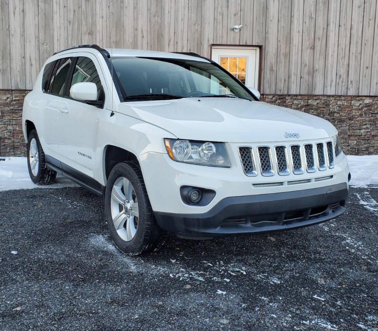 2015 White /Gray/Black Jeep Compass (1C4NJDEB2FD) with an 2.4L I4 2.4L I4 engine, located at 4845 Woodbury Pike, Roaring Springs, PA, (814) 317-5008, (814) 317-5008, 40.250935, -78.366959 - Photo#0