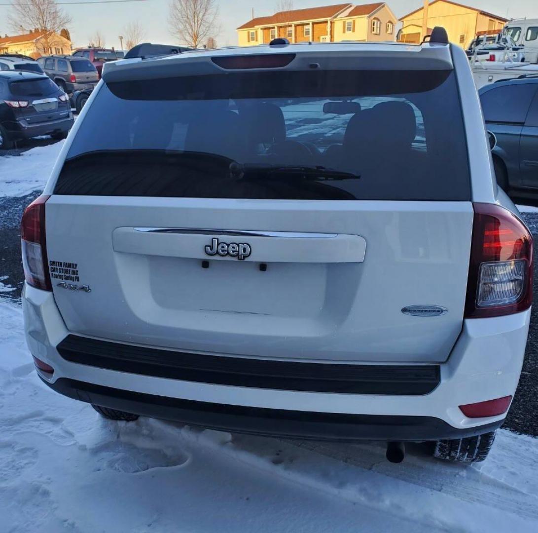 2015 White /Gray/Black Jeep Compass (1C4NJDEB2FD) with an 2.4L I4 2.4L I4 engine, located at 4845 Woodbury Pike, Roaring Springs, PA, (814) 317-5008, (814) 317-5008, 40.250935, -78.366959 - 2015 Jeep Compass Latitude 4x4 4dr SUV, 2.4L 4-cyclinder Automatic, leather heated seats, aluminum wheels. Super clean with no rust. Selling so cheap due to vehicle having rear bumper taillight damage. We replaced it with one the same color. Vehicle runs and drives 100% with no issues, but it does h - Photo#2