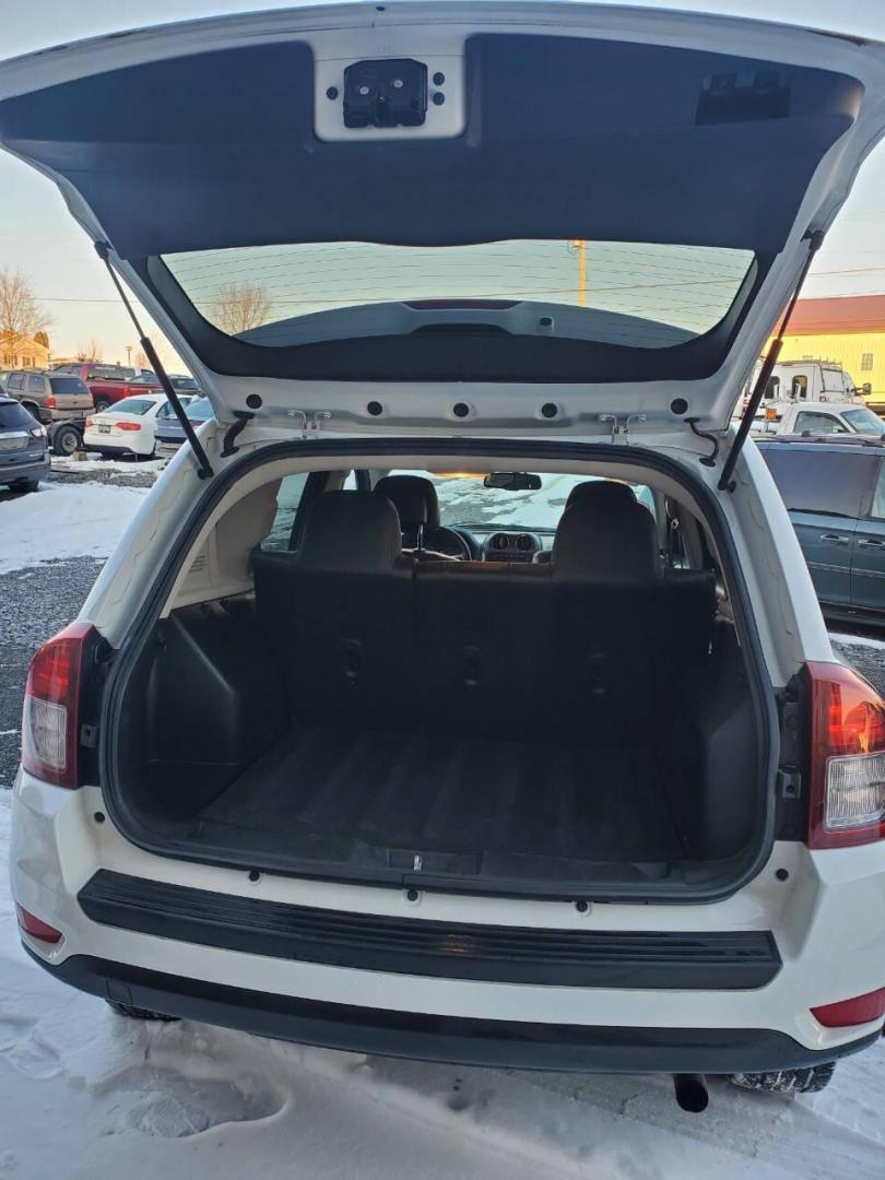 2015 White /Gray/Black Jeep Compass (1C4NJDEB2FD) with an 2.4L I4 2.4L I4 engine, located at 4845 Woodbury Pike, Roaring Springs, PA, (814) 317-5008, (814) 317-5008, 40.250935, -78.366959 - 2015 Jeep Compass Latitude 4x4 4dr SUV, 2.4L 4-cyclinder Automatic, leather heated seats, aluminum wheels. Super clean with no rust. Selling so cheap due to vehicle having rear bumper taillight damage. We replaced it with one the same color. Vehicle runs and drives 100% with no issues, but it does h - Photo#3
