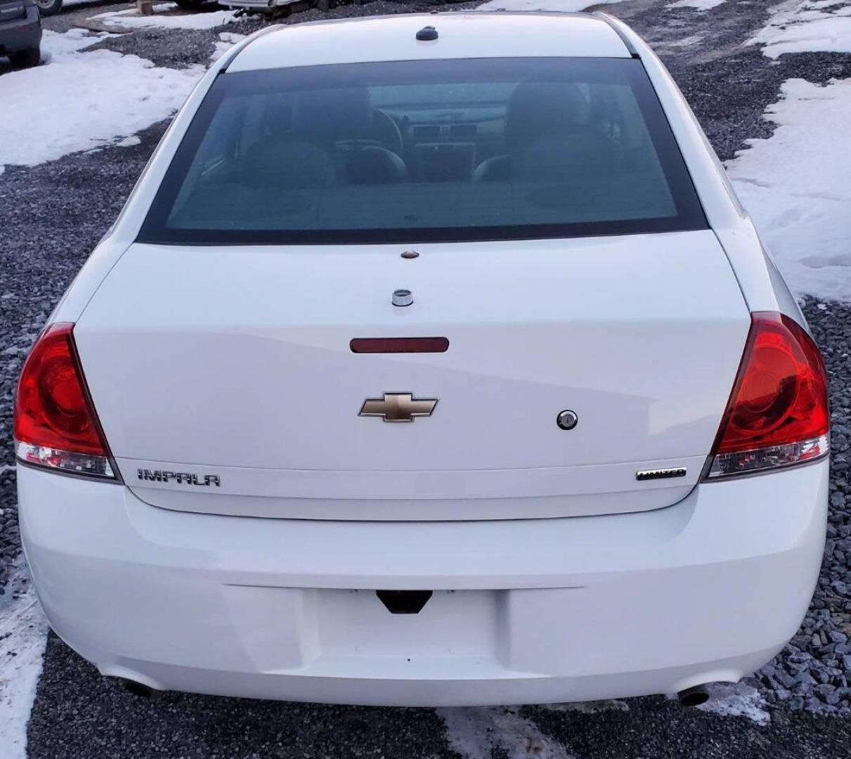 2015 White Chevrolet Impala Limited (2G1WD5E37F1) with an 3.6L V6 3.6L V6 engine, located at 4845 Woodbury Pike, Roaring Springs, PA, (814) 317-5008, (814) 317-5008, 40.250935, -78.366959 - Photo#2