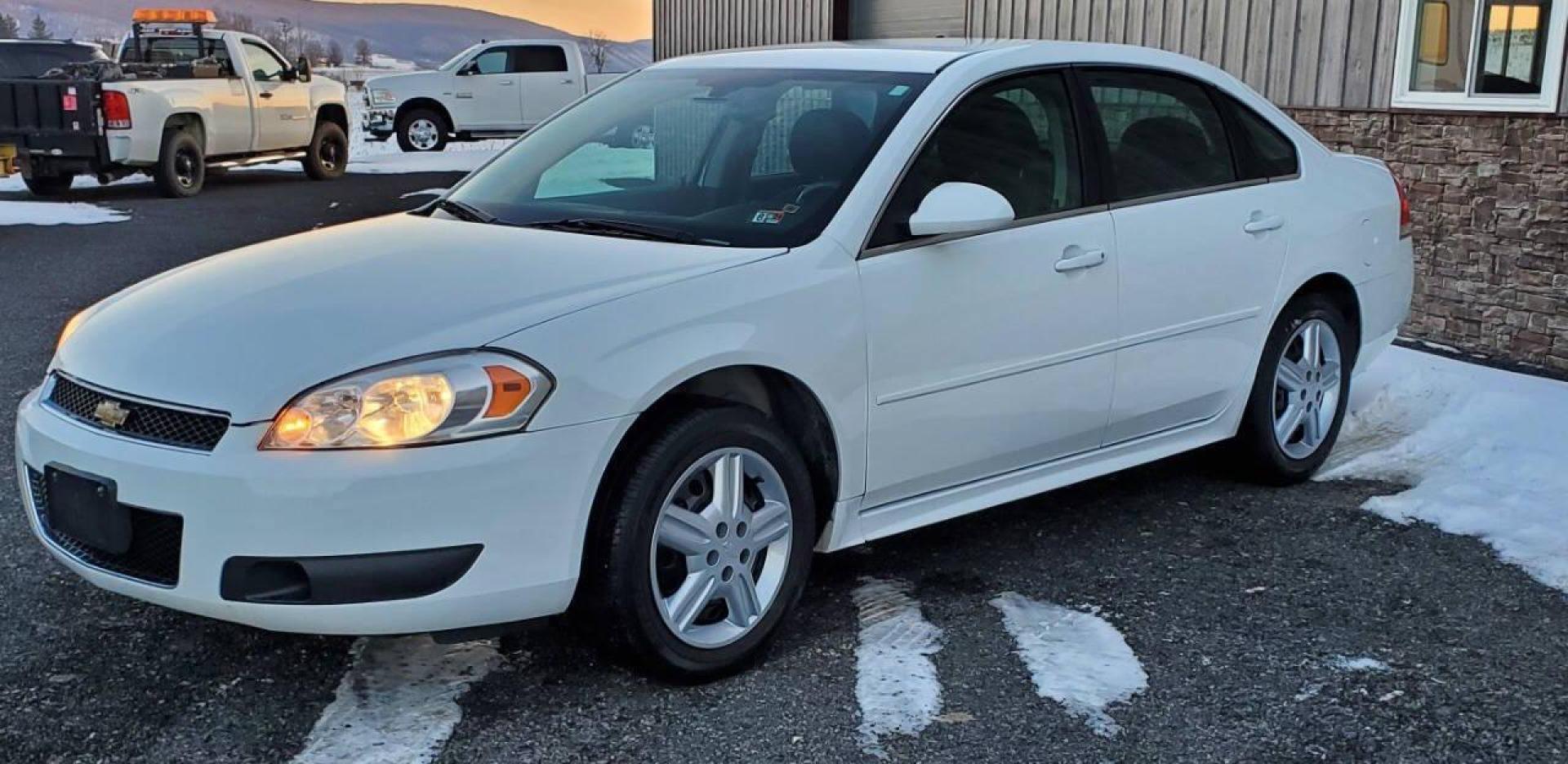 2015 White Chevrolet Impala Limited (2G1WD5E37F1) with an 3.6L V6 3.6L V6 engine, located at 4845 Woodbury Pike, Roaring Springs, PA, (814) 317-5008, (814) 317-5008, 40.250935, -78.366959 - 2015 Chevrolet Impala Limited automatic, 164k, FWD, power windows/locks, cruise/tilt wheel, air conditioning, new inspection. Flex fuel! Southern vehicle from Virginia. Well maintained! Clean! Will come with a 3 month/4500-mile power train warranty with the option to upgrade. To see a full list of t - Photo#3