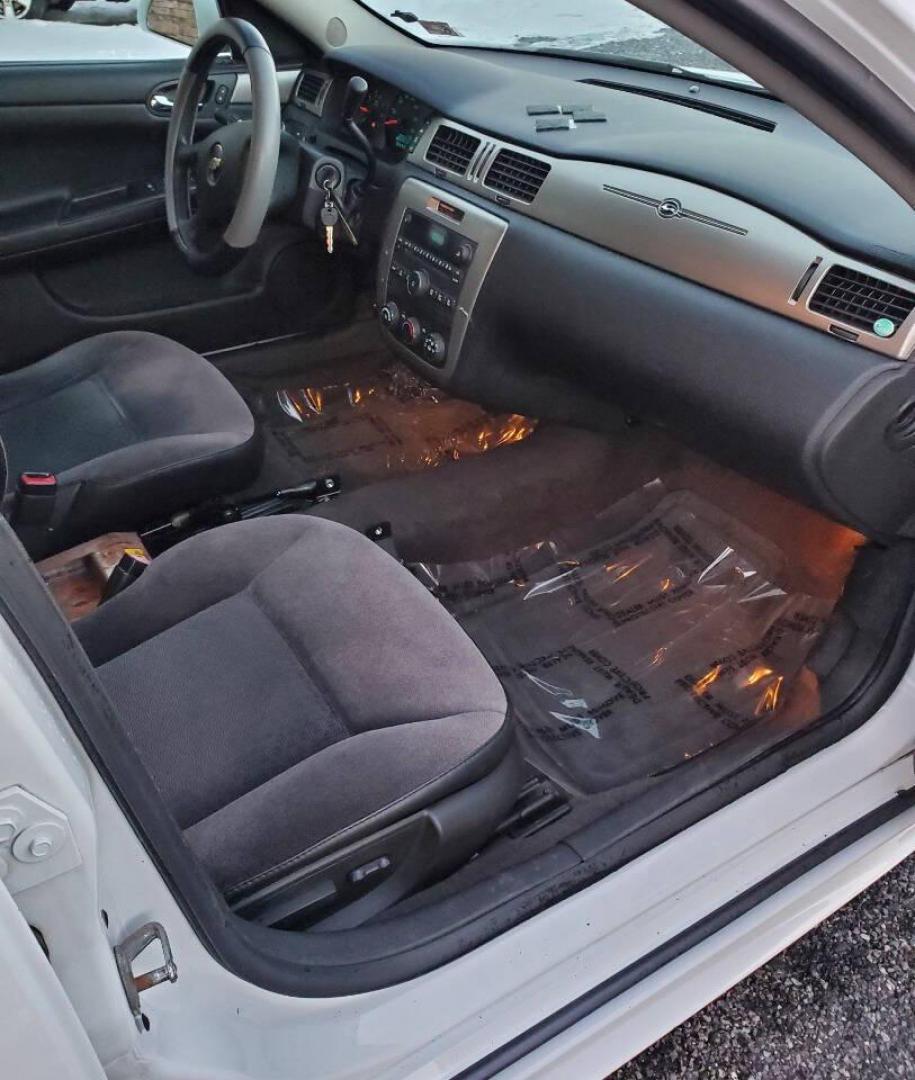 2015 White Chevrolet Impala Limited (2G1WD5E37F1) with an 3.6L V6 3.6L V6 engine, located at 4845 Woodbury Pike, Roaring Springs, PA, (814) 317-5008, (814) 317-5008, 40.250935, -78.366959 - 2015 Chevrolet Impala Limited automatic, 164k, FWD, power windows/locks, cruise/tilt wheel, air conditioning, new inspection. Flex fuel! Southern vehicle from Virginia. Well maintained! Clean! Will come with a 3 month/4500-mile power train warranty with the option to upgrade. To see a full list of t - Photo#11