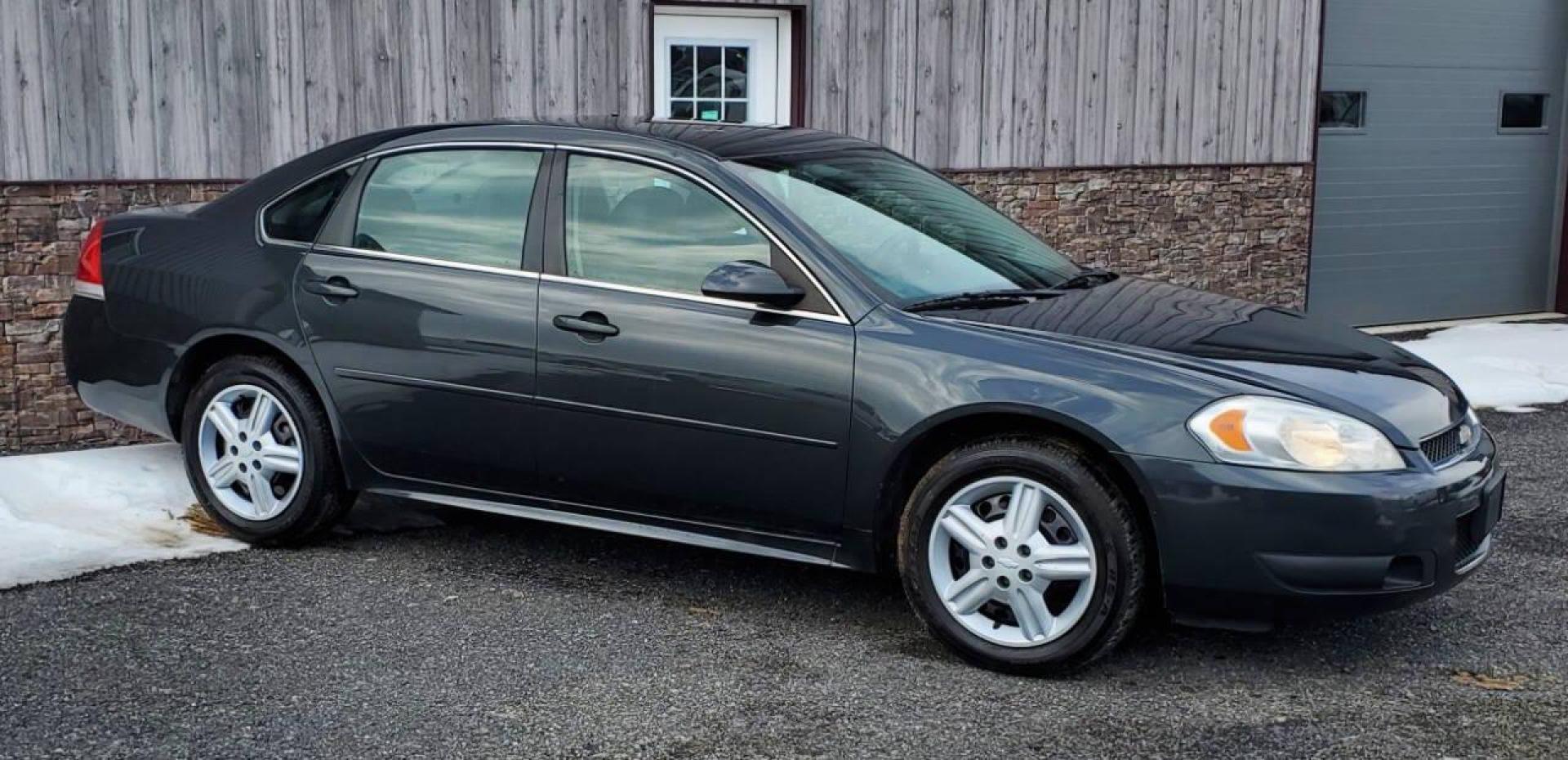 2013 Gray Chevrolet Impala (2G1WD5E34D1) with an 3.6L V6 3.6L V6 engine, located at 4845 Woodbury Pike, Roaring Springs, PA, (814) 317-5008, (814) 317-5008, 40.250935, -78.366959 - 2015 Chevrolet Impala Limited automatic, 127k, FWD, power windows/locks, cruise/tilt wheel, air conditioning, new inspection. Flex fuel! Southern vehicle from Virginia. Well maintained! Clean! Will come with a 3 month/4500-mile power train warranty with the option to upgrade. To see a full list of t - Photo#1