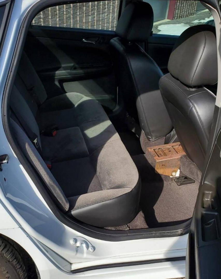 2015 White /Gray Chevrolet Impala Limited Police Cruiser (2G1WD5E30F1) with an 3.6L V6 3.6L V6 engine, located at 4845 Woodbury Pike, Roaring Springs, PA, (814) 317-5008, (814) 317-5008, 40.250935, -78.366959 - 2015 Chevrolet Impala Limited automatic, 151k, FWD, power windows/locks, cruise/tilt wheel, air conditioning, new inspection. Flex fuel! Southern vehicle from Virginia. Well maintained! Clean! Will come with a 3 month/4500-mile power train warranty with the option to upgrade. To see a full list of t - Photo#13