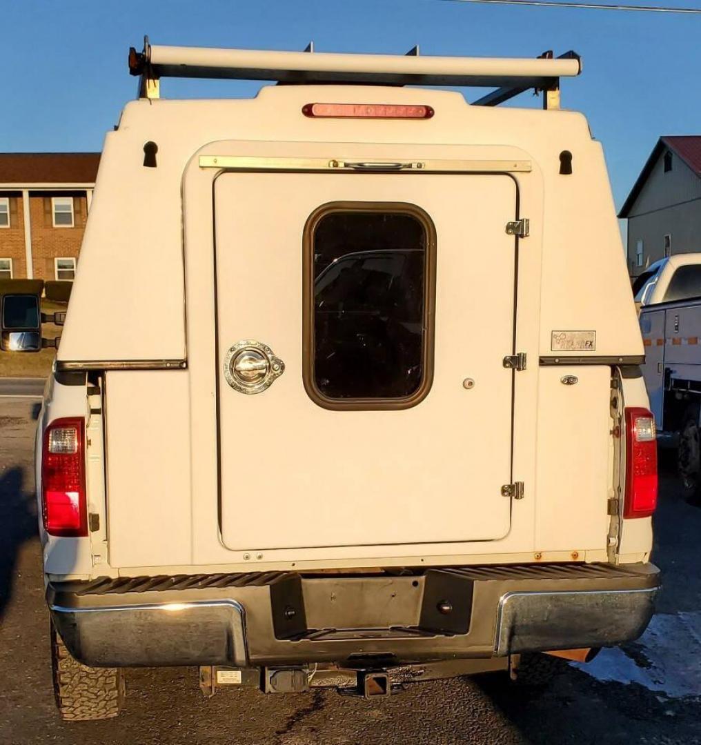 2011 White Ford F-250 Super Duty (1FTBF2B68BE) with an 6.2L V8 6.2L V8 engine, located at 4845 Woodbury Pike, Roaring Springs, PA, (814) 317-5008, (814) 317-5008, 40.250935, -78.366959 - 2011 Ford F250 4X4 V8 8' bed Flex Fuel Lots of tread left on the tires. One owner government owned, well maintained. Clean truck! Being priced low due to bed rails have some holes, body is rust free. Will come with a new inspection. If you would like more info on this vehicle or any of the others w - Photo#3