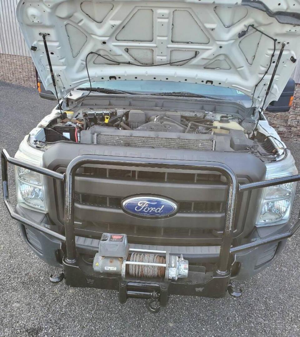 2011 White Ford F-250 Super Duty (1FTBF2B68BE) with an 6.2L V8 6.2L V8 engine, located at 4845 Woodbury Pike, Roaring Springs, PA, (814) 317-5008, (814) 317-5008, 40.250935, -78.366959 - 2011 Ford F250 4X4 V8 8' bed Flex Fuel Lots of tread left on the tires. One owner government owned, well maintained. Clean truck! Being priced low due to bed rails have some holes, body is rust free. Will come with a new inspection. If you would like more info on this vehicle or any of the others w - Photo#5