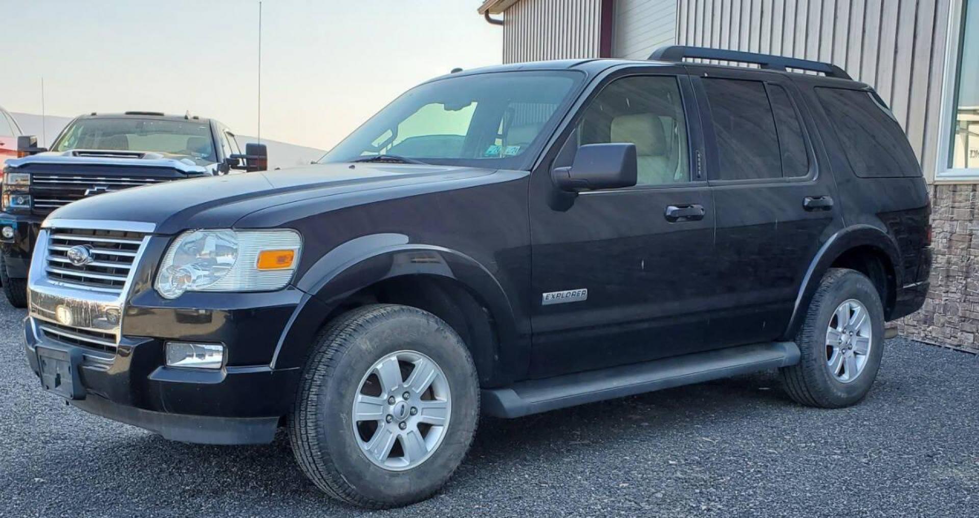 2008 Black Ford Explorer (1FMEU73E98U) with an 4.0L V6 4.0L V6 engine, located at 4845 Woodbury Pike, Roaring Springs, PA, (814) 317-5008, (814) 317-5008, 40.250935, -78.366959 - Please read entire description!! This vehicle will need towed!! 2008 Ford Explorer XLT 4X4 4.0L V6 Automatic 154,575 miles New tires, leather seats, not a rusty vehicle and it's ready for inspection. This vehicle does have a salvage title due to rear deck lid damage. Small antifreeze leak near the - Photo#3