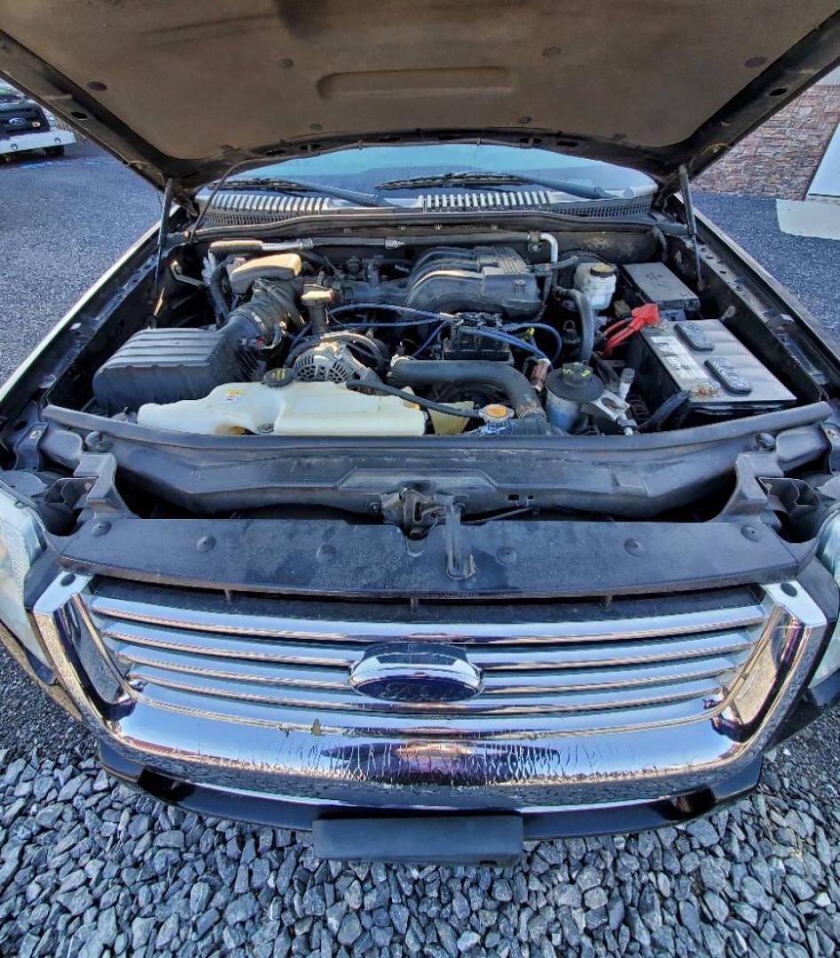 2008 Black Ford Explorer (1FMEU73E98U) with an 4.0L V6 4.0L V6 engine, located at 4845 Woodbury Pike, Roaring Springs, PA, (814) 317-5008, (814) 317-5008, 40.250935, -78.366959 - Please read entire description!! This vehicle will need towed!! 2008 Ford Explorer XLT 4X4 4.0L V6 Automatic 154,575 miles New tires, leather seats, not a rusty vehicle and it's ready for inspection. This vehicle does have a salvage title due to rear deck lid damage. Small antifreeze leak near the - Photo#4