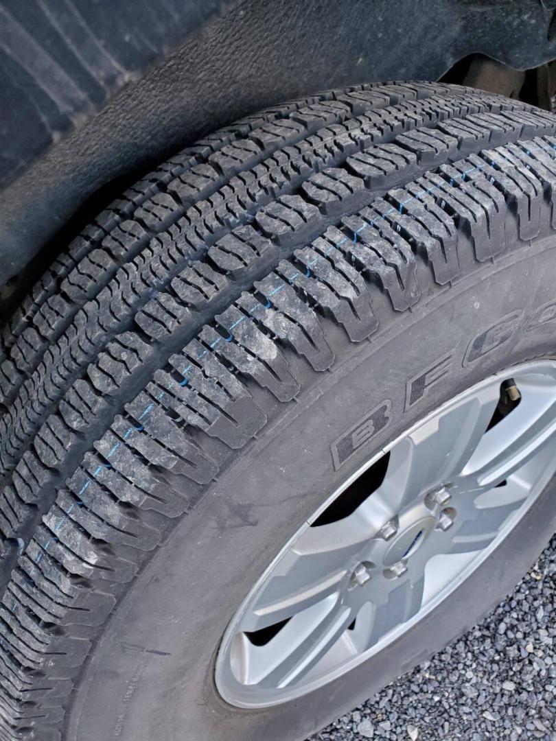 2008 Black Ford Explorer (1FMEU73E98U) with an 4.0L V6 4.0L V6 engine, located at 4845 Woodbury Pike, Roaring Springs, PA, (814) 317-5008, (814) 317-5008, 40.250935, -78.366959 - Please read entire description!! This vehicle will need towed!! 2008 Ford Explorer XLT 4X4 4.0L V6 Automatic 154,575 miles New tires, leather seats, not a rusty vehicle and it's ready for inspection. This vehicle does have a salvage title due to rear deck lid damage. Small antifreeze leak near the - Photo#6