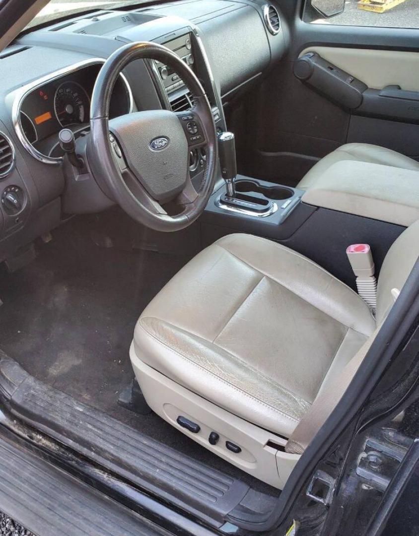 2008 Black Ford Explorer (1FMEU73E98U) with an 4.0L V6 4.0L V6 engine, located at 4845 Woodbury Pike, Roaring Springs, PA, (814) 317-5008, (814) 317-5008, 40.250935, -78.366959 - Please read entire description!! This vehicle will need towed!! 2008 Ford Explorer XLT 4X4 4.0L V6 Automatic 154,575 miles New tires, leather seats, not a rusty vehicle and it's ready for inspection. This vehicle does have a salvage title due to rear deck lid damage. Small antifreeze leak near the - Photo#8