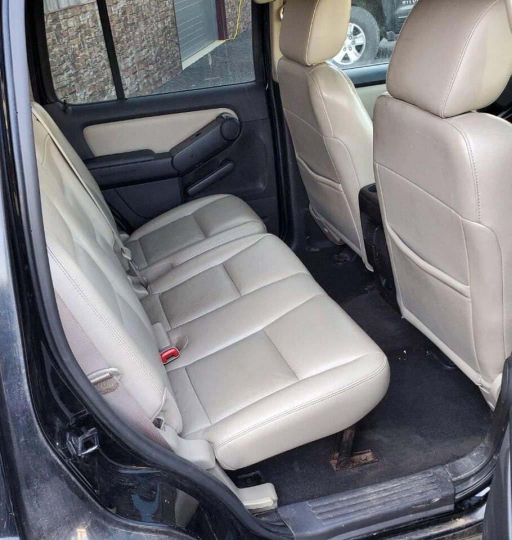 2008 Black Ford Explorer (1FMEU73E98U) with an 4.0L V6 4.0L V6 engine, located at 4845 Woodbury Pike, Roaring Springs, PA, (814) 317-5008, (814) 317-5008, 40.250935, -78.366959 - Please read entire description!! This vehicle will need towed!! 2008 Ford Explorer XLT 4X4 4.0L V6 Automatic 154,575 miles New tires, leather seats, not a rusty vehicle and it's ready for inspection. This vehicle does have a salvage title due to rear deck lid damage. Small antifreeze leak near the - Photo#14