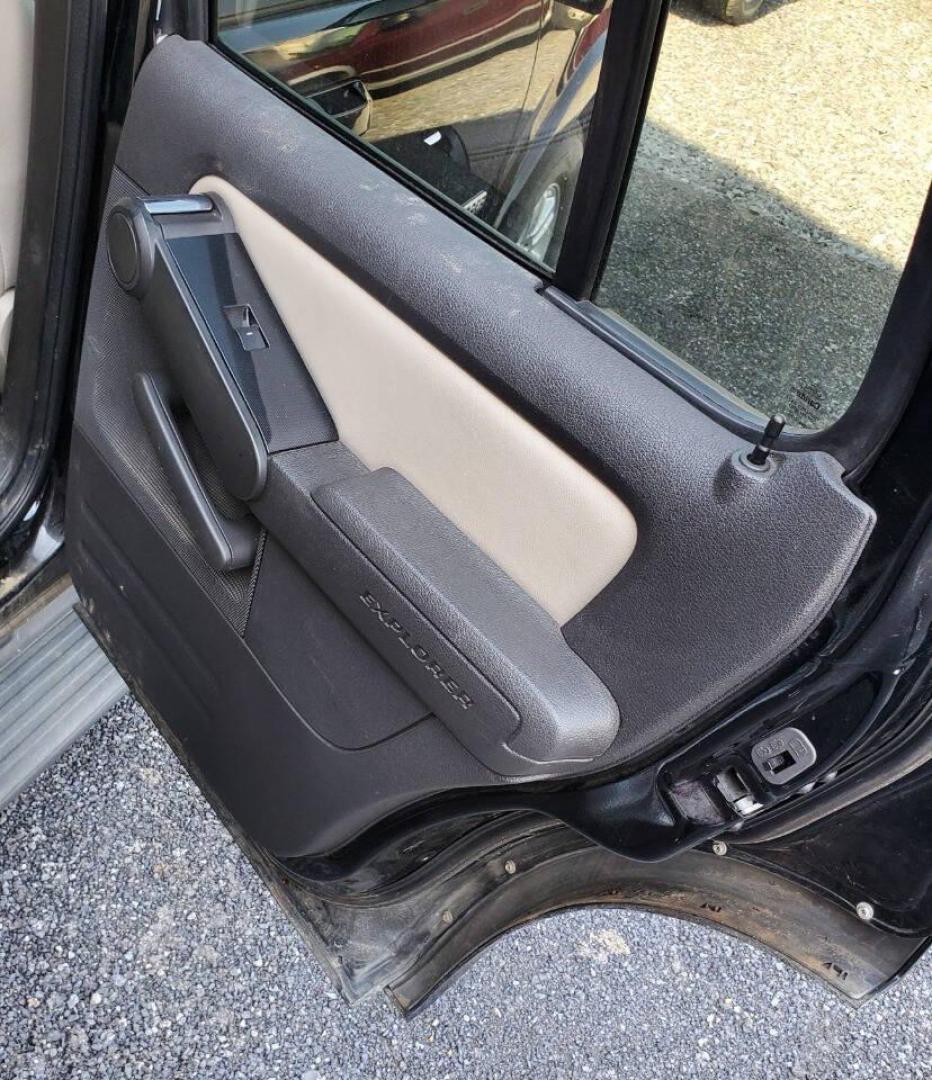 2008 Black Ford Explorer (1FMEU73E98U) with an 4.0L V6 4.0L V6 engine, located at 4845 Woodbury Pike, Roaring Springs, PA, (814) 317-5008, (814) 317-5008, 40.250935, -78.366959 - Please read entire description!! This vehicle will need towed!! 2008 Ford Explorer XLT 4X4 4.0L V6 Automatic 154,575 miles New tires, leather seats, not a rusty vehicle and it's ready for inspection. This vehicle does have a salvage title due to rear deck lid damage. Small antifreeze leak near the - Photo#15