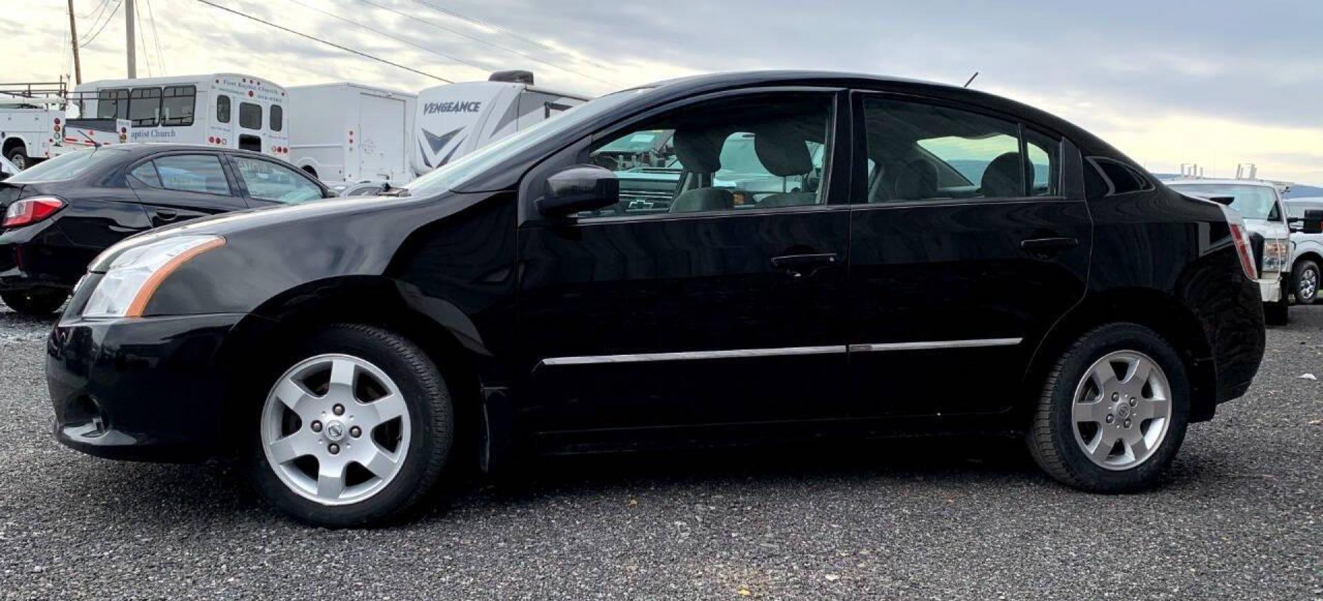 2012 Black Nissan Sentra (3N1AB6AP3CL) with an 2.0L I4 2.0L I4 engine, located at 4845 Woodbury Pike, Roaring Springs, PA, (814) 317-5008, (814) 317-5008, 40.250935, -78.366959 - Photo#2