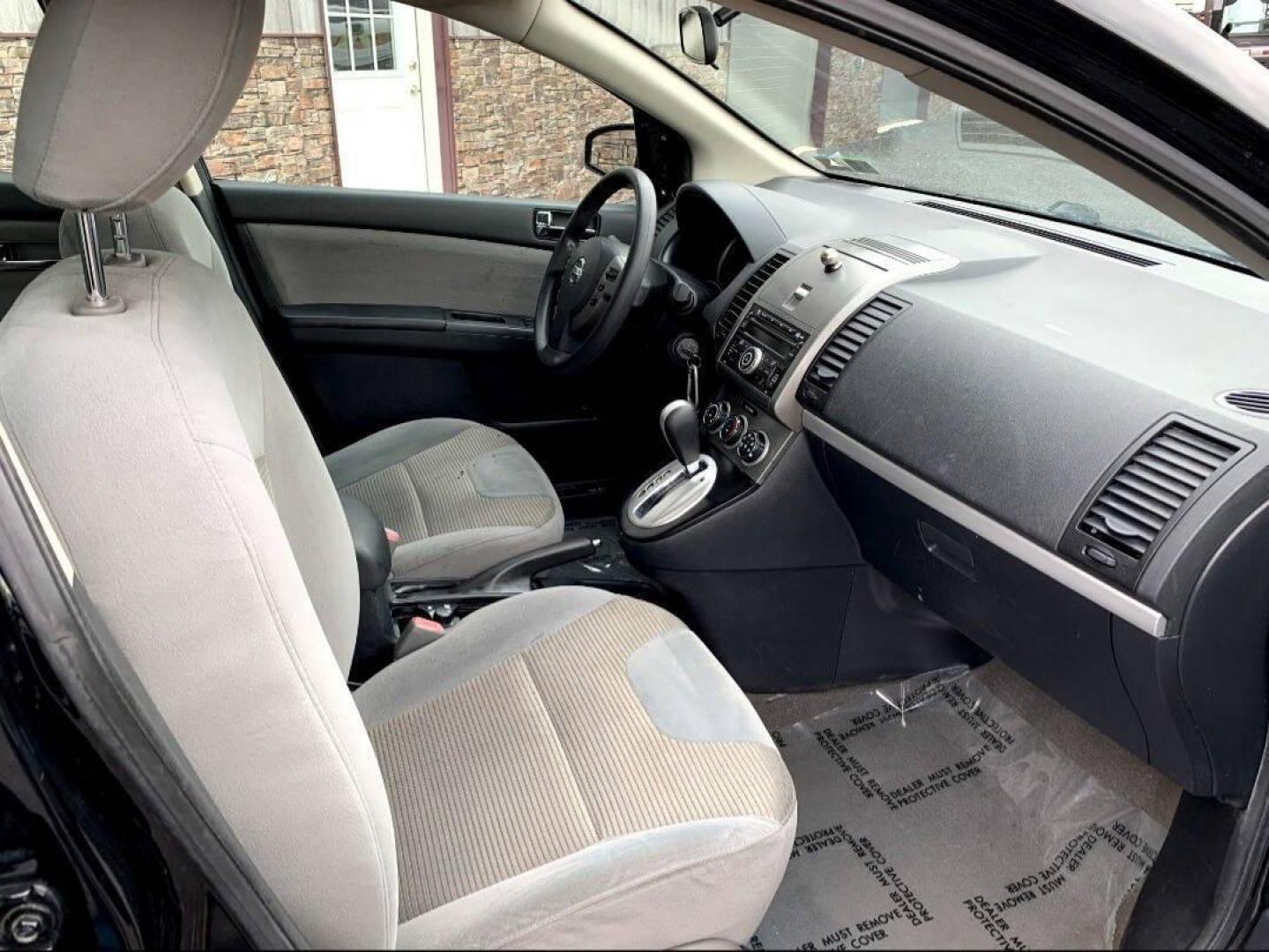 2012 Black Nissan Sentra (3N1AB6AP3CL) with an 2.0L I4 2.0L I4 engine, located at 4845 Woodbury Pike, Roaring Springs, PA, (814) 317-5008, (814) 317-5008, 40.250935, -78.366959 - 2012 Nissan Sentra 2.0L Automatic CVT 152,034 miles FWD Power Windows and Locks CD Player New Inspection This vehicle comes with a 3 month/3000-mile power train warranty with the option to upgrade. If you would like more info on this vehicle or any of the others we currently have for sale, please vi - Photo#9