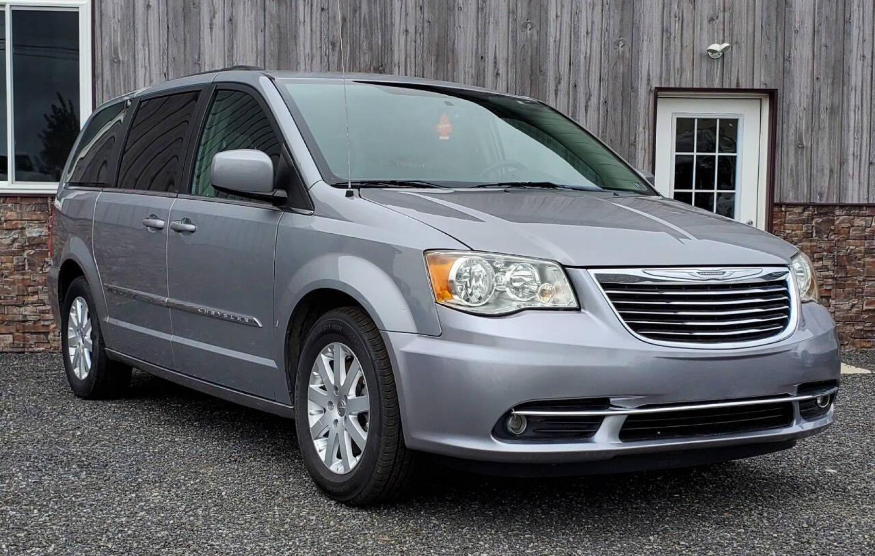 2014 Silver Chrysler Town and Country (2C4RC1BG8ER) with an 3.6L V6 3.6L V6 engine, located at 4845 Woodbury Pike, Roaring Springs, PA, (814) 317-5008, (814) 317-5008, 40.250935, -78.366959 - 2014 Chrysler Town and Country Touring 3.6L V6 FWD Automatic 124K miles Flex Fuel 3rd row seating, A/C, CD Player, Sirius, Bluetooth, Back-up Camera, Rear DVD Player, Leather-trimmed Seats Vehicle has R-Title due to right/front damage to headlight/bumper/grill. New Inspection. Vehicle comes with 3 m - Photo#0