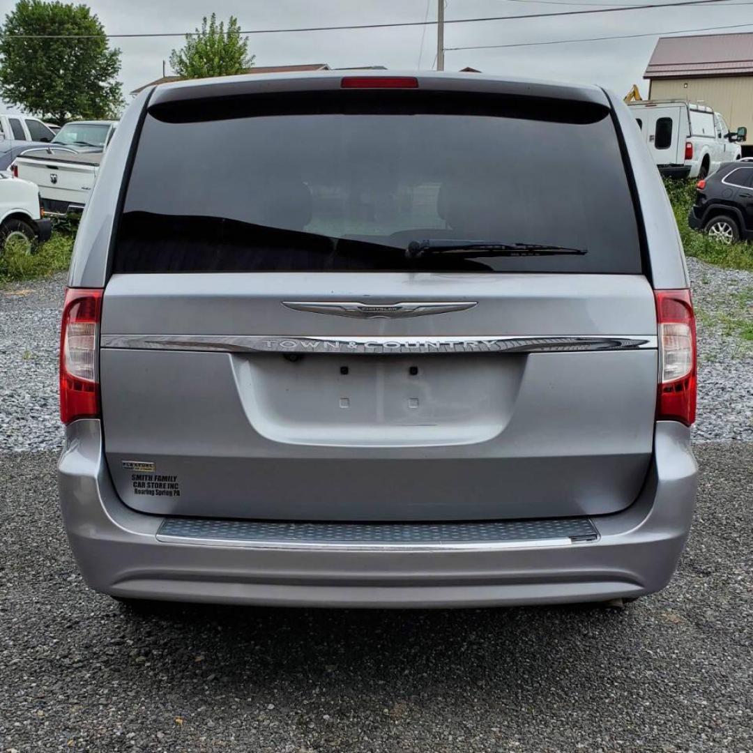 2014 Silver Chrysler Town and Country (2C4RC1BG8ER) with an 3.6L V6 3.6L V6 engine, located at 4845 Woodbury Pike, Roaring Springs, PA, (814) 317-5008, (814) 317-5008, 40.250935, -78.366959 - 2014 Chrysler Town and Country Touring 3.6L V6 FWD Automatic 124K miles Flex Fuel 3rd row seating, A/C, CD Player, Sirius, Bluetooth, Back-up Camera, Rear DVD Player, Leather-trimmed Seats Vehicle has R-Title due to right/front damage to headlight/bumper/grill. New Inspection. Vehicle comes with 3 m - Photo#2