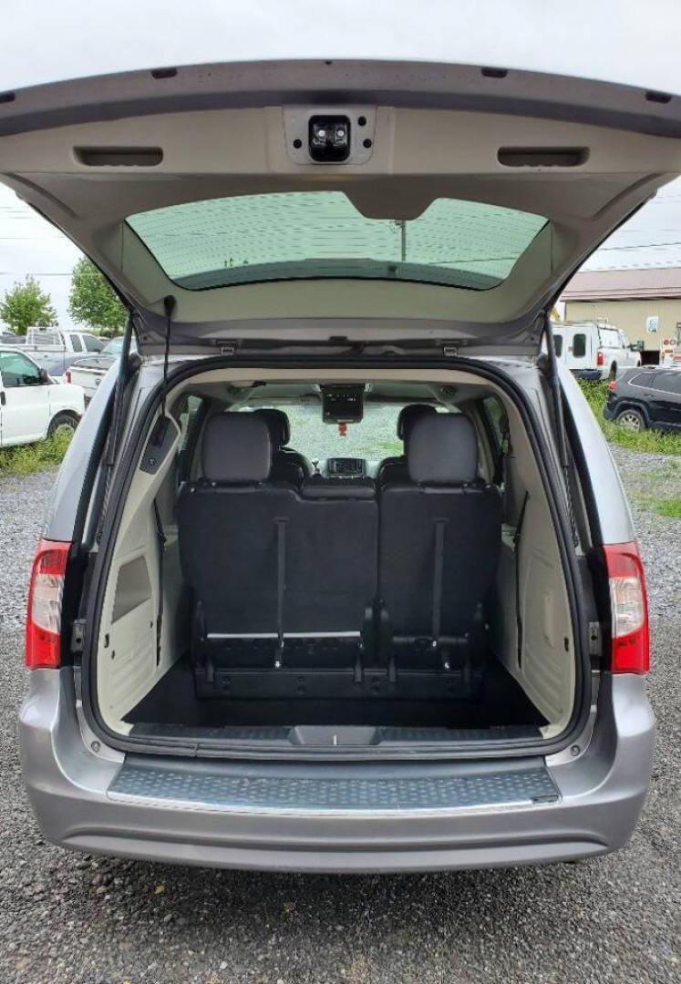 2014 Silver Chrysler Town and Country (2C4RC1BG8ER) with an 3.6L V6 3.6L V6 engine, located at 4845 Woodbury Pike, Roaring Springs, PA, (814) 317-5008, (814) 317-5008, 40.250935, -78.366959 - 2014 Chrysler Town and Country Touring 3.6L V6 FWD Automatic 124K miles Flex Fuel 3rd row seating, A/C, CD Player, Sirius, Bluetooth, Back-up Camera, Rear DVD Player, Leather-trimmed Seats Vehicle has R-Title due to right/front damage to headlight/bumper/grill. New Inspection. Vehicle comes with 3 m - Photo#3