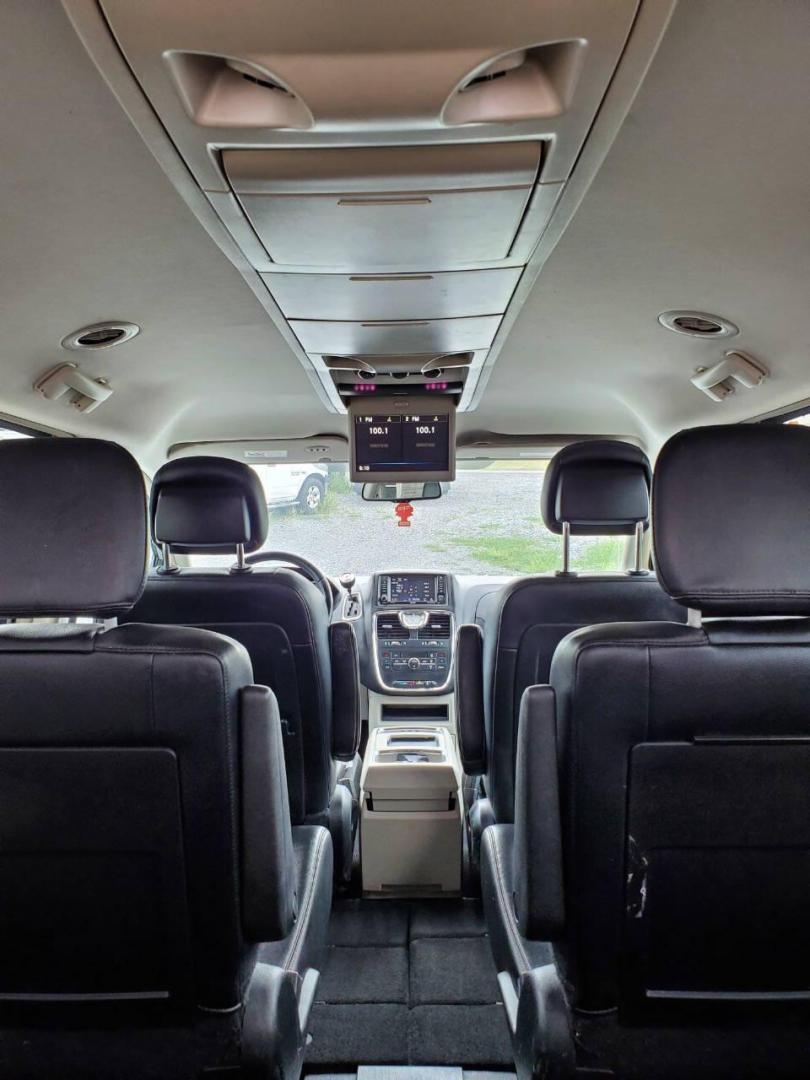 2014 Silver Chrysler Town and Country (2C4RC1BG8ER) with an 3.6L V6 3.6L V6 engine, located at 4845 Woodbury Pike, Roaring Springs, PA, (814) 317-5008, (814) 317-5008, 40.250935, -78.366959 - 2014 Chrysler Town and Country Touring 3.6L V6 FWD Automatic 124K miles Flex Fuel 3rd row seating, A/C, CD Player, Sirius, Bluetooth, Back-up Camera, Rear DVD Player, Leather-trimmed Seats Vehicle has R-Title due to right/front damage to headlight/bumper/grill. New Inspection. Vehicle comes with 3 m - Photo#4