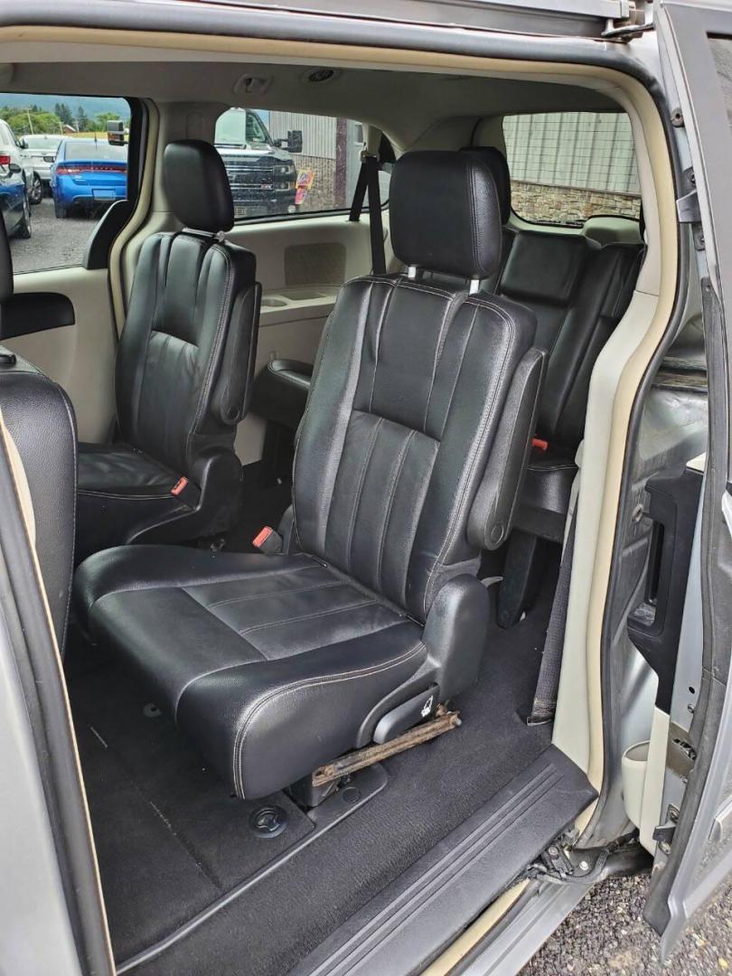 2014 Silver Chrysler Town and Country (2C4RC1BG8ER) with an 3.6L V6 3.6L V6 engine, located at 4845 Woodbury Pike, Roaring Springs, PA, (814) 317-5008, (814) 317-5008, 40.250935, -78.366959 - 2014 Chrysler Town and Country Touring 3.6L V6 FWD Automatic 124K miles Flex Fuel 3rd row seating, A/C, CD Player, Sirius, Bluetooth, Back-up Camera, Rear DVD Player, Leather-trimmed Seats Vehicle has R-Title due to right/front damage to headlight/bumper/grill. New Inspection. Vehicle comes with 3 m - Photo#11