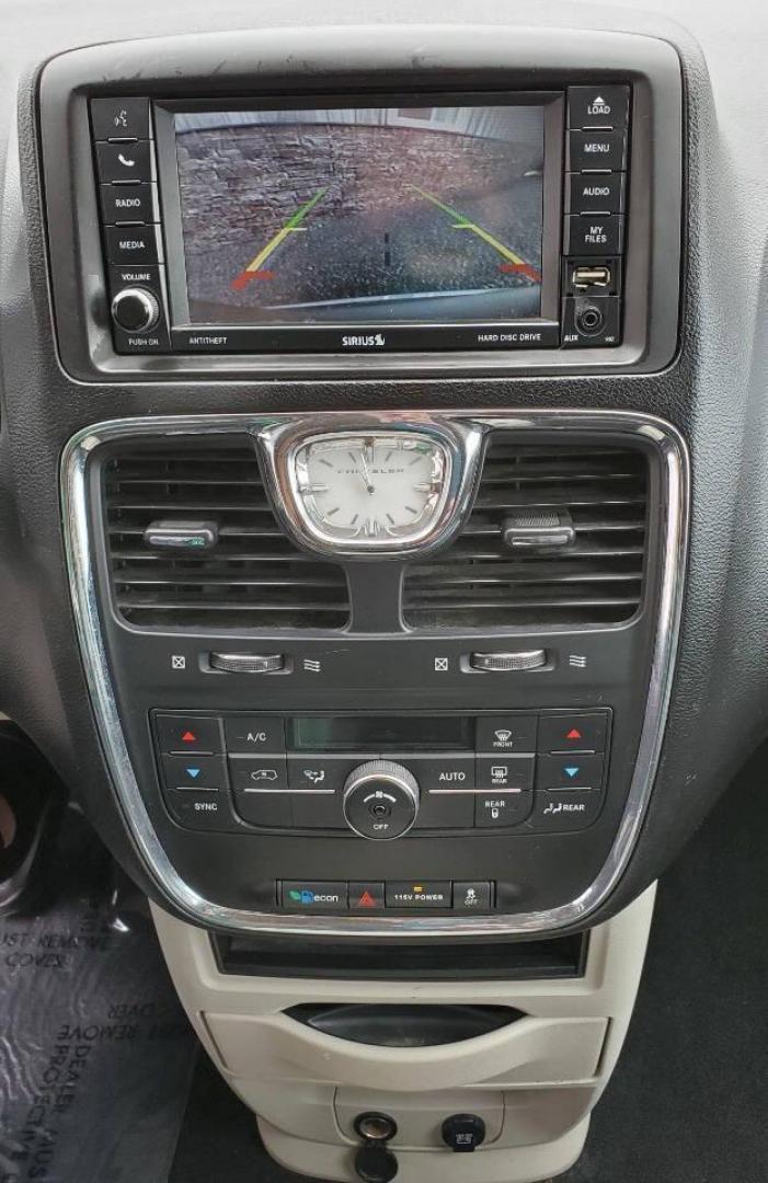 2014 Silver Chrysler Town and Country (2C4RC1BG8ER) with an 3.6L V6 3.6L V6 engine, located at 4845 Woodbury Pike, Roaring Springs, PA, (814) 317-5008, (814) 317-5008, 40.250935, -78.366959 - 2014 Chrysler Town and Country Touring 3.6L V6 FWD Automatic 124K miles Flex Fuel 3rd row seating, A/C, CD Player, Sirius, Bluetooth, Back-up Camera, Rear DVD Player, Leather-trimmed Seats Vehicle has R-Title due to right/front damage to headlight/bumper/grill. New Inspection. Vehicle comes with 3 m - Photo#15