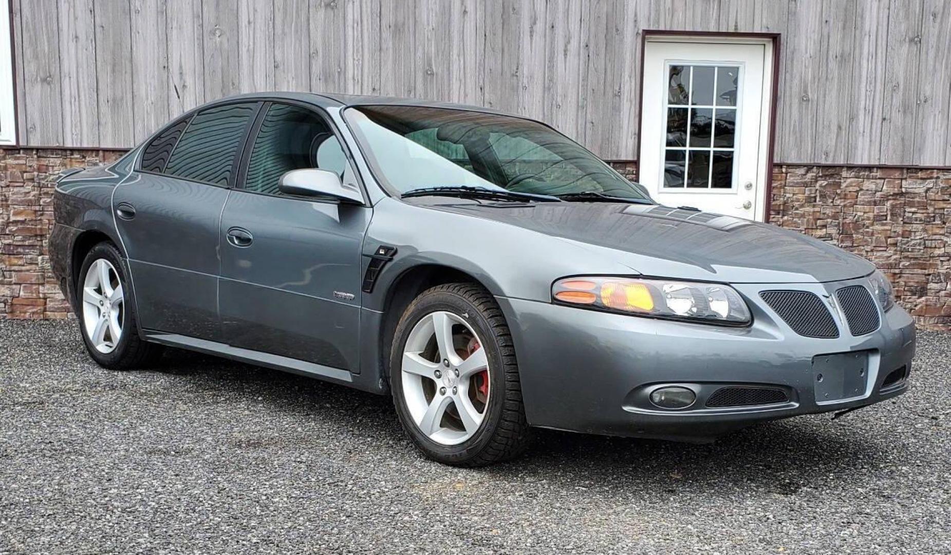 2004 Gray Pontiac Bonneville (1G2HZ54Y94U) with an 4.6L V8 4.6L V8 engine, located at 4845 Woodbury Pike, Roaring Springs, PA, (814) 317-5008, (814) 317-5008, 40.250935, -78.366959 - 2004 Pontiac Bonneville GXP 4.6L V8 Automatic FWD 95K miles A/C, Cruise Control, Keyless Entry, CD Player and Cassette Player, OnStar, Power Windows and Door Locks New Inspection Will come with 3mo/3,000-mile warranty with option to upgrade. If interested, please call 814-317-5008 - Photo#0