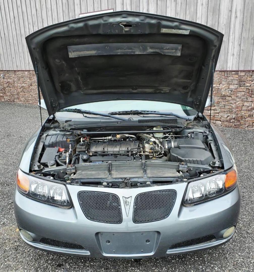 2004 Gray Pontiac Bonneville (1G2HZ54Y94U) with an 4.6L V8 4.6L V8 engine, located at 4845 Woodbury Pike, Roaring Springs, PA, (814) 317-5008, (814) 317-5008, 40.250935, -78.366959 - 2004 Pontiac Bonneville GXP 4.6L V8 Automatic FWD 95K miles A/C, Cruise Control, Keyless Entry, CD Player and Cassette Player, OnStar, Power Windows and Door Locks New Inspection Will come with 3mo/3,000-mile warranty with option to upgrade. If interested, please call 814-317-5008 - Photo#4