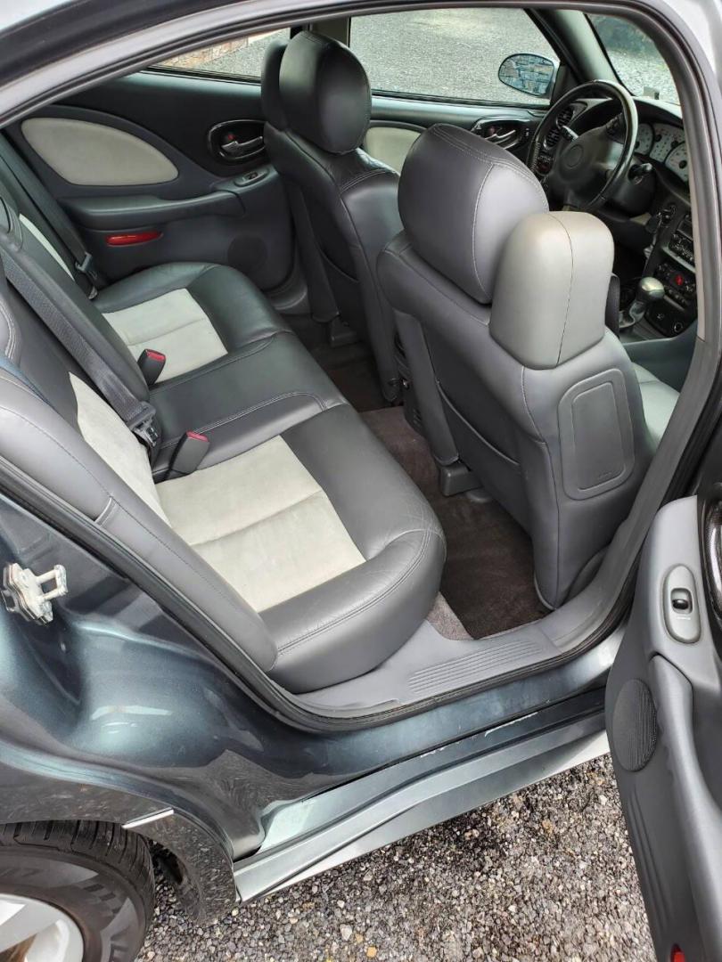 2004 Gray Pontiac Bonneville (1G2HZ54Y94U) with an 4.6L V8 4.6L V8 engine, located at 4845 Woodbury Pike, Roaring Springs, PA, (814) 317-5008, (814) 317-5008, 40.250935, -78.366959 - 2004 Pontiac Bonneville GXP 4.6L V8 Automatic FWD 95K miles A/C, Cruise Control, Keyless Entry, CD Player and Cassette Player, OnStar, Power Windows and Door Locks New Inspection Will come with 3mo/3,000-mile warranty with option to upgrade. If interested, please call 814-317-5008 - Photo#14