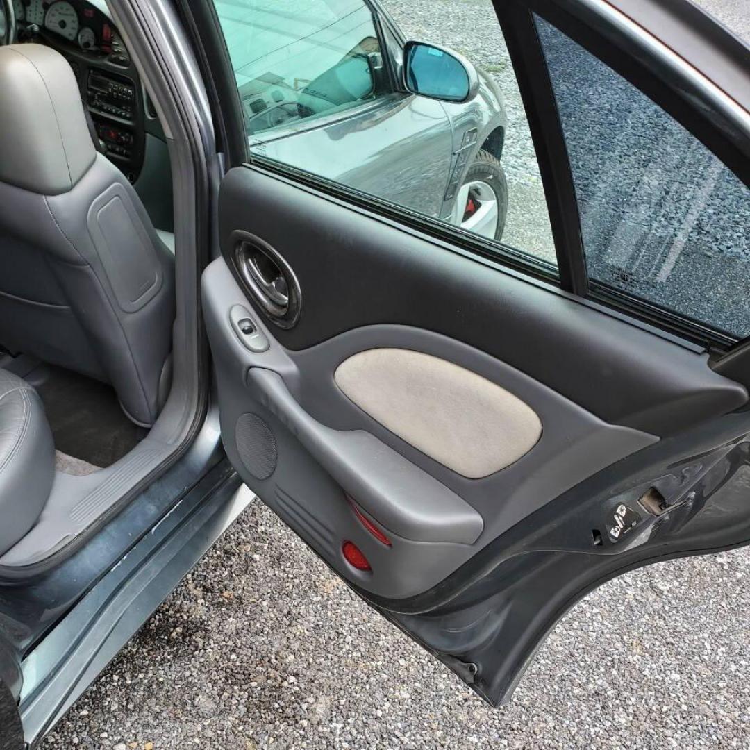 2004 Gray Pontiac Bonneville (1G2HZ54Y94U) with an 4.6L V8 4.6L V8 engine, located at 4845 Woodbury Pike, Roaring Springs, PA, (814) 317-5008, (814) 317-5008, 40.250935, -78.366959 - 2004 Pontiac Bonneville GXP 4.6L V8 Automatic FWD 95K miles A/C, Cruise Control, Keyless Entry, CD Player and Cassette Player, OnStar, Power Windows and Door Locks New Inspection Will come with 3mo/3,000-mile warranty with option to upgrade. If interested, please call 814-317-5008 - Photo#15