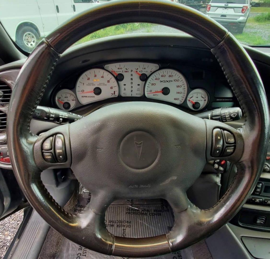 2004 Gray Pontiac Bonneville (1G2HZ54Y94U) with an 4.6L V8 4.6L V8 engine, located at 4845 Woodbury Pike, Roaring Springs, PA, (814) 317-5008, (814) 317-5008, 40.250935, -78.366959 - 2004 Pontiac Bonneville GXP 4.6L V8 Automatic FWD 95K miles A/C, Cruise Control, Keyless Entry, CD Player and Cassette Player, OnStar, Power Windows and Door Locks New Inspection Will come with 3mo/3,000-mile warranty with option to upgrade. If interested, please call 814-317-5008 - Photo#17