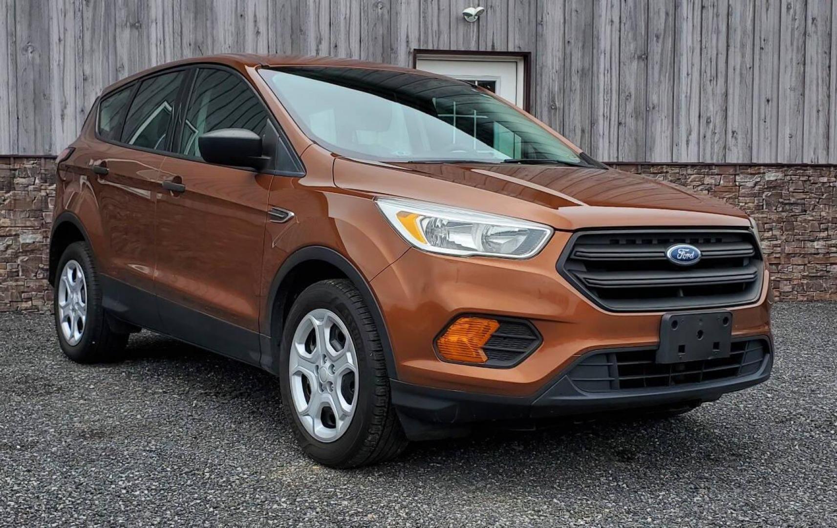 2017 Canyon Ridge Metallic Ford Escape (1FMCU0F76HU) with an 2.5L I4 2.5L I4 engine, located at 4845 Woodbury Pike, Roaring Springs, PA, (814) 317-5008, (814) 317-5008, 40.250935, -78.366959 - 2017 Ford Escape S 2.5L I4 Automatic FWD 93K miles Power Windows and Locks, A/C, CD Player, SYNC, Back-up Camera Nice Southern Vehicle! New Inspection. Vehicle comes with 3 mo./3,000-mile warranty with the option to upgrade. If interested, please call 814-317-5008 - Photo#0