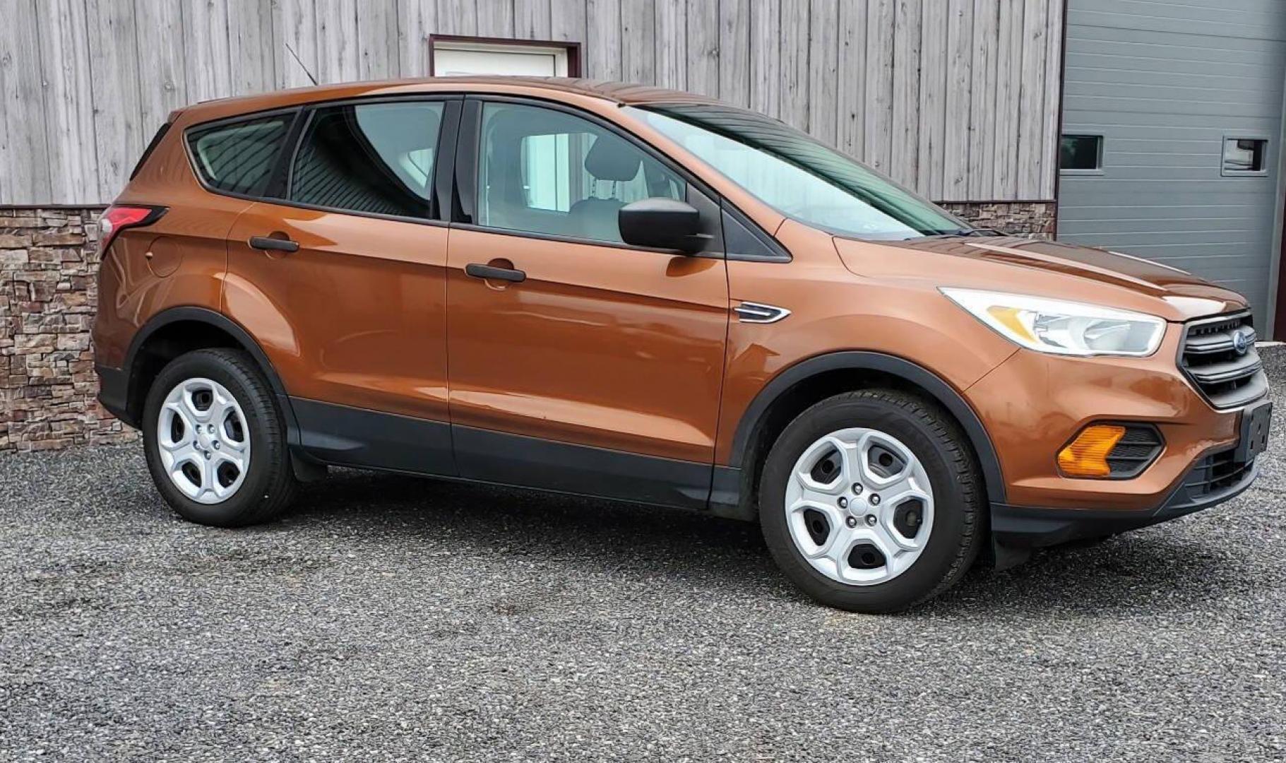 2017 Canyon Ridge Metallic Ford Escape (1FMCU0F76HU) with an 2.5L I4 2.5L I4 engine, located at 4845 Woodbury Pike, Roaring Springs, PA, (814) 317-5008, (814) 317-5008, 40.250935, -78.366959 - 2017 Ford Escape S 2.5L I4 Automatic FWD 93K miles Power Windows and Locks, A/C, CD Player, SYNC, Back-up Camera Nice Southern Vehicle! New Inspection. Vehicle comes with 3 mo./3,000-mile warranty with the option to upgrade. If interested, please call 814-317-5008 - Photo#1