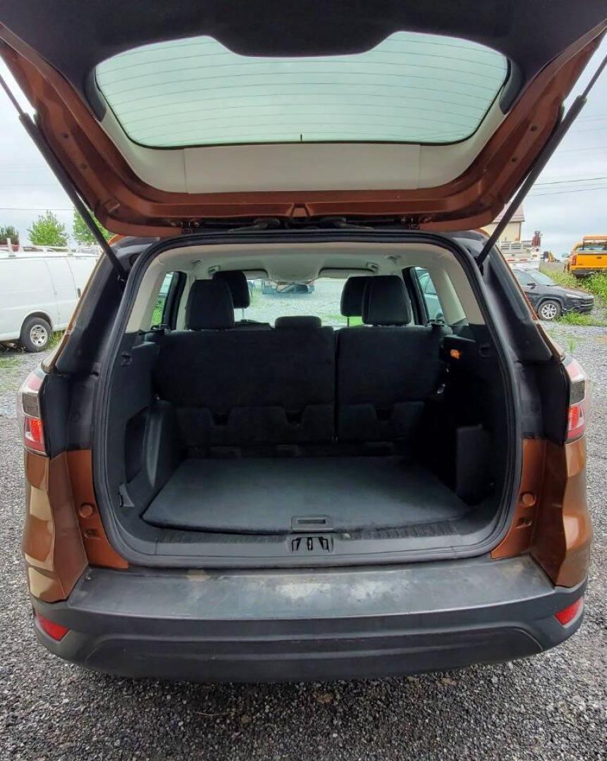 2017 Canyon Ridge Metallic Ford Escape (1FMCU0F76HU) with an 2.5L I4 2.5L I4 engine, located at 4845 Woodbury Pike, Roaring Springs, PA, (814) 317-5008, (814) 317-5008, 40.250935, -78.366959 - 2017 Ford Escape S 2.5L I4 Automatic FWD 93K miles Power Windows and Locks, A/C, CD Player, SYNC, Back-up Camera Nice Southern Vehicle! New Inspection. Vehicle comes with 3 mo./3,000-mile warranty with the option to upgrade. If interested, please call 814-317-5008 - Photo#3