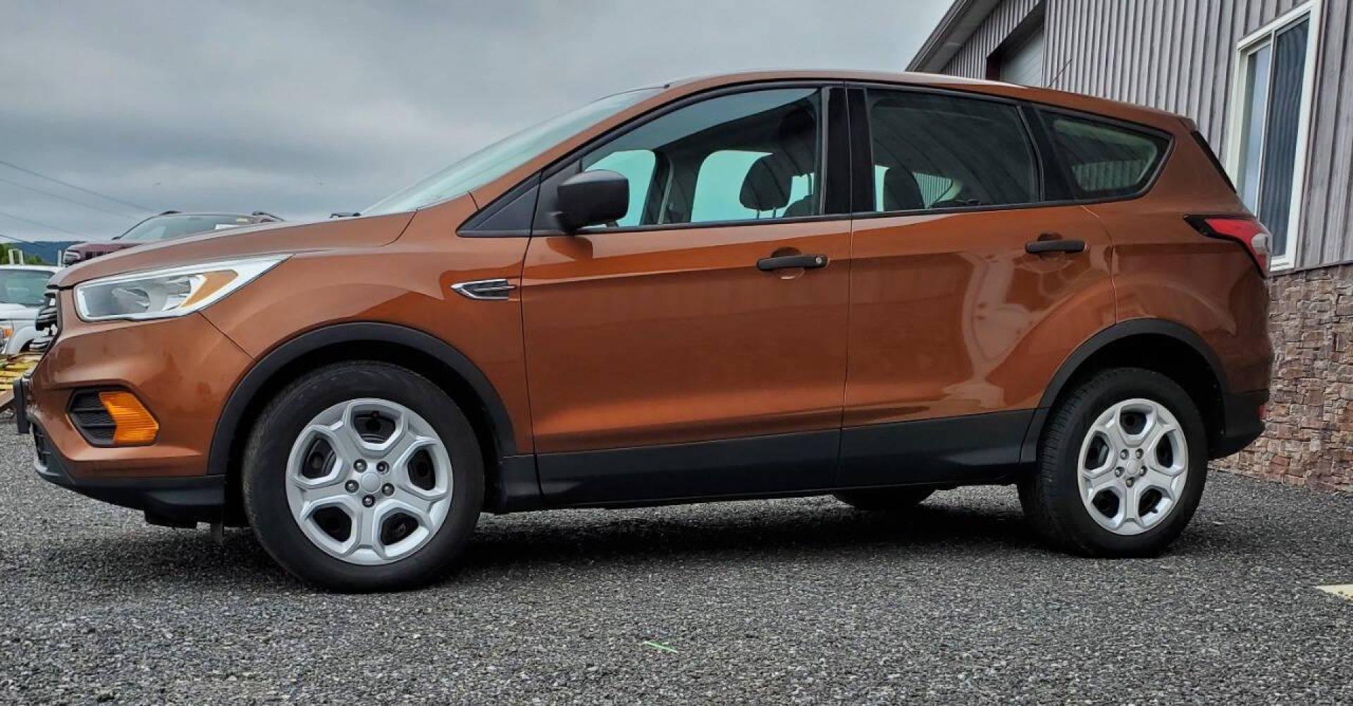 2017 Canyon Ridge Metallic Ford Escape (1FMCU0F76HU) with an 2.5L I4 2.5L I4 engine, located at 4845 Woodbury Pike, Roaring Springs, PA, (814) 317-5008, (814) 317-5008, 40.250935, -78.366959 - 2017 Ford Escape S 2.5L I4 Automatic FWD 93K miles Power Windows and Locks, A/C, CD Player, SYNC, Back-up Camera Nice Southern Vehicle! New Inspection. Vehicle comes with 3 mo./3,000-mile warranty with the option to upgrade. If interested, please call 814-317-5008 - Photo#4