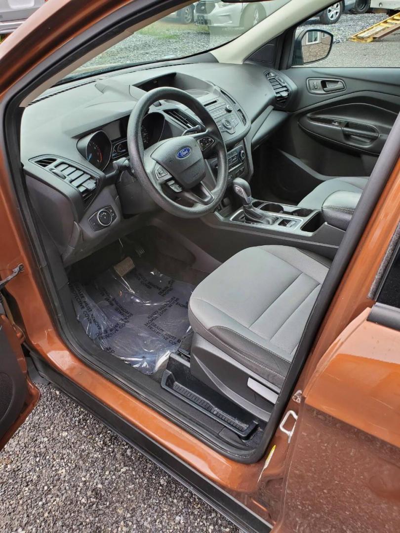 2017 Canyon Ridge Metallic Ford Escape (1FMCU0F76HU) with an 2.5L I4 2.5L I4 engine, located at 4845 Woodbury Pike, Roaring Springs, PA, (814) 317-5008, (814) 317-5008, 40.250935, -78.366959 - 2017 Ford Escape S 2.5L I4 Automatic FWD 93K miles Power Windows and Locks, A/C, CD Player, SYNC, Back-up Camera Nice Southern Vehicle! New Inspection. Vehicle comes with 3 mo./3,000-mile warranty with the option to upgrade. If interested, please call 814-317-5008 - Photo#8